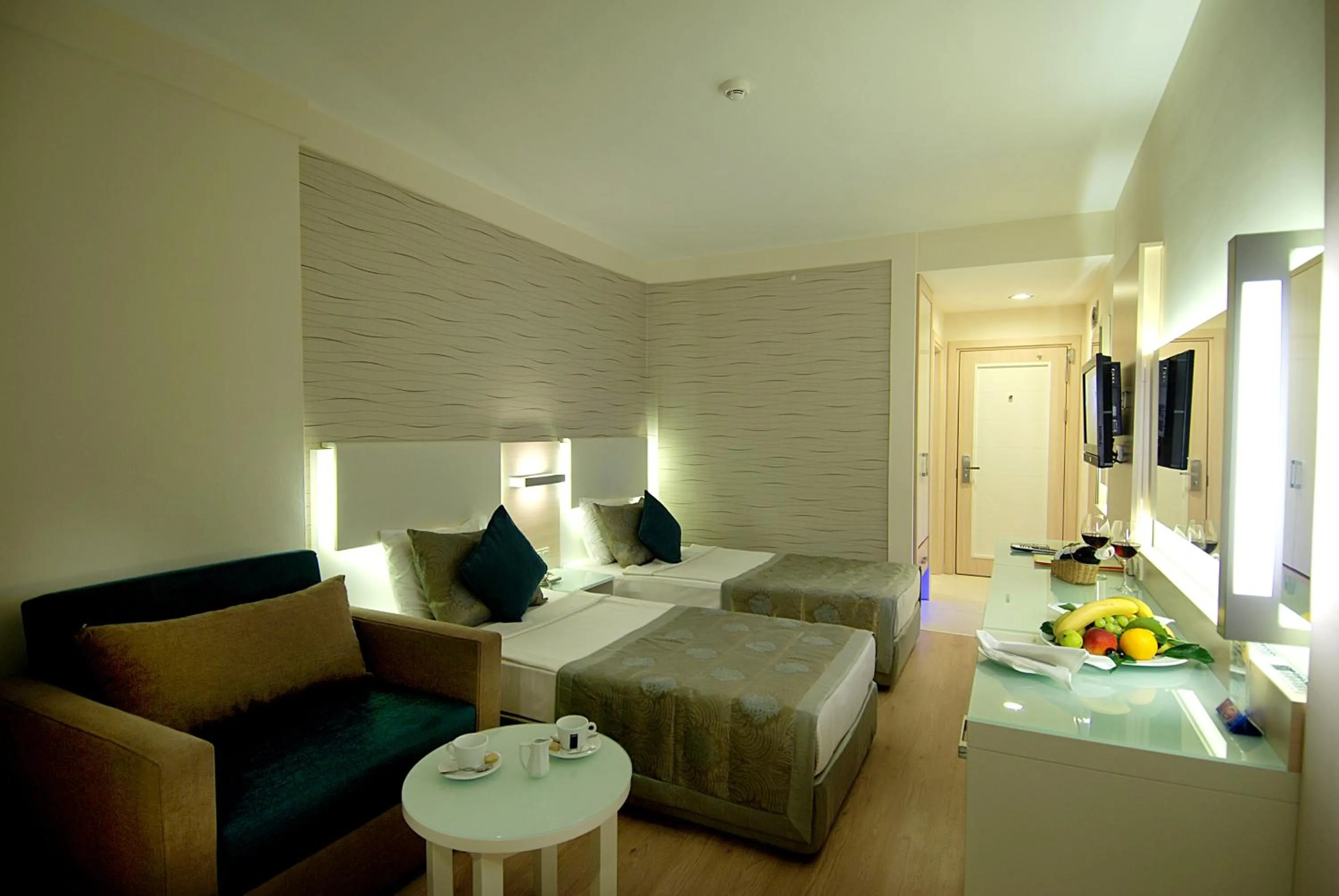 Photo of the whole room, Bed in Grand Okan Hotel