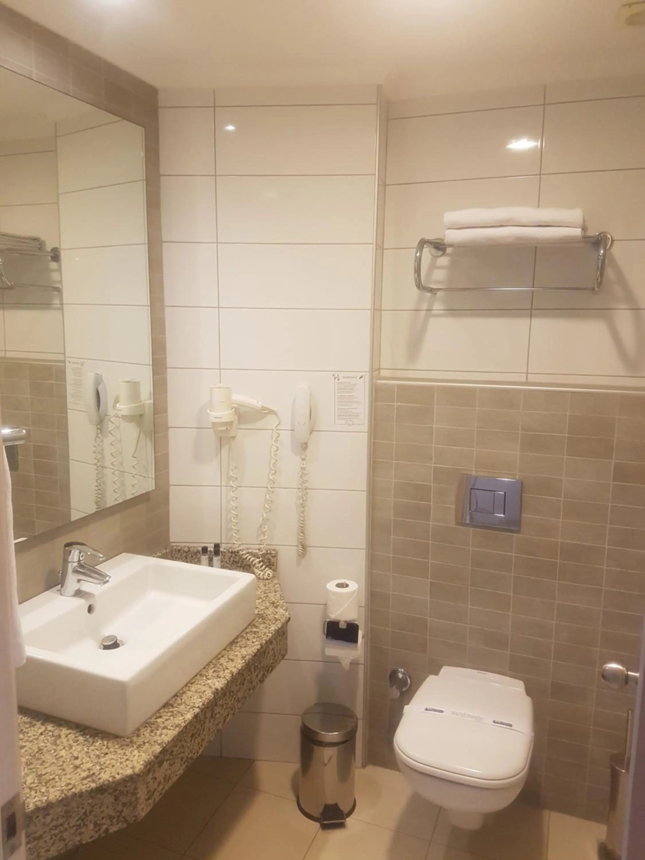 Bathroom in Grand Okan Hotel