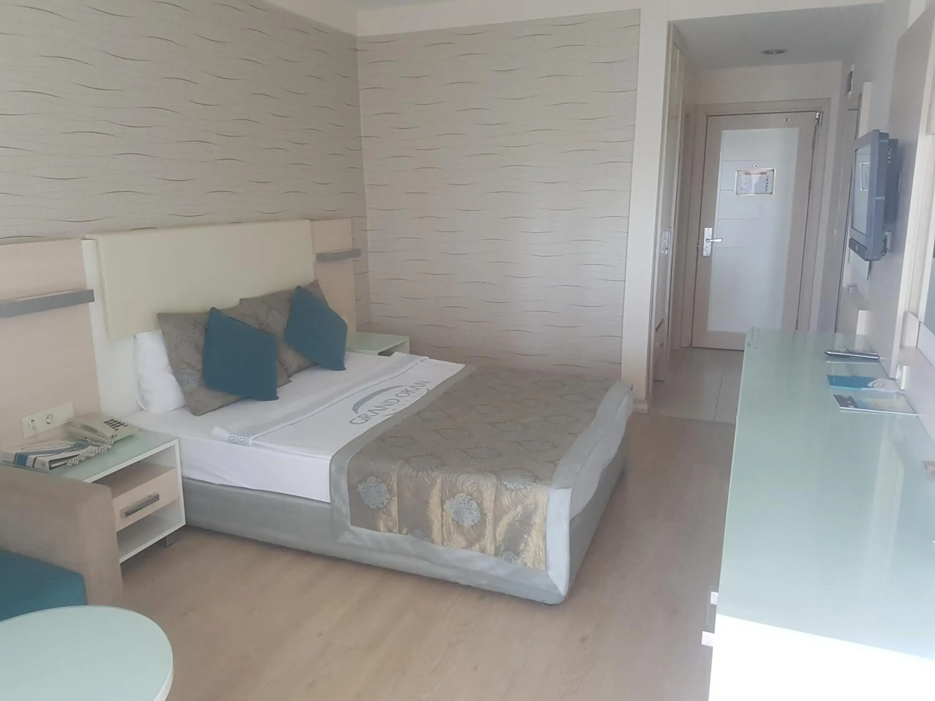 Photo of the whole room, Bed in Grand Okan Hotel Photo of the whole room, Bed in Grand Okan Hotel