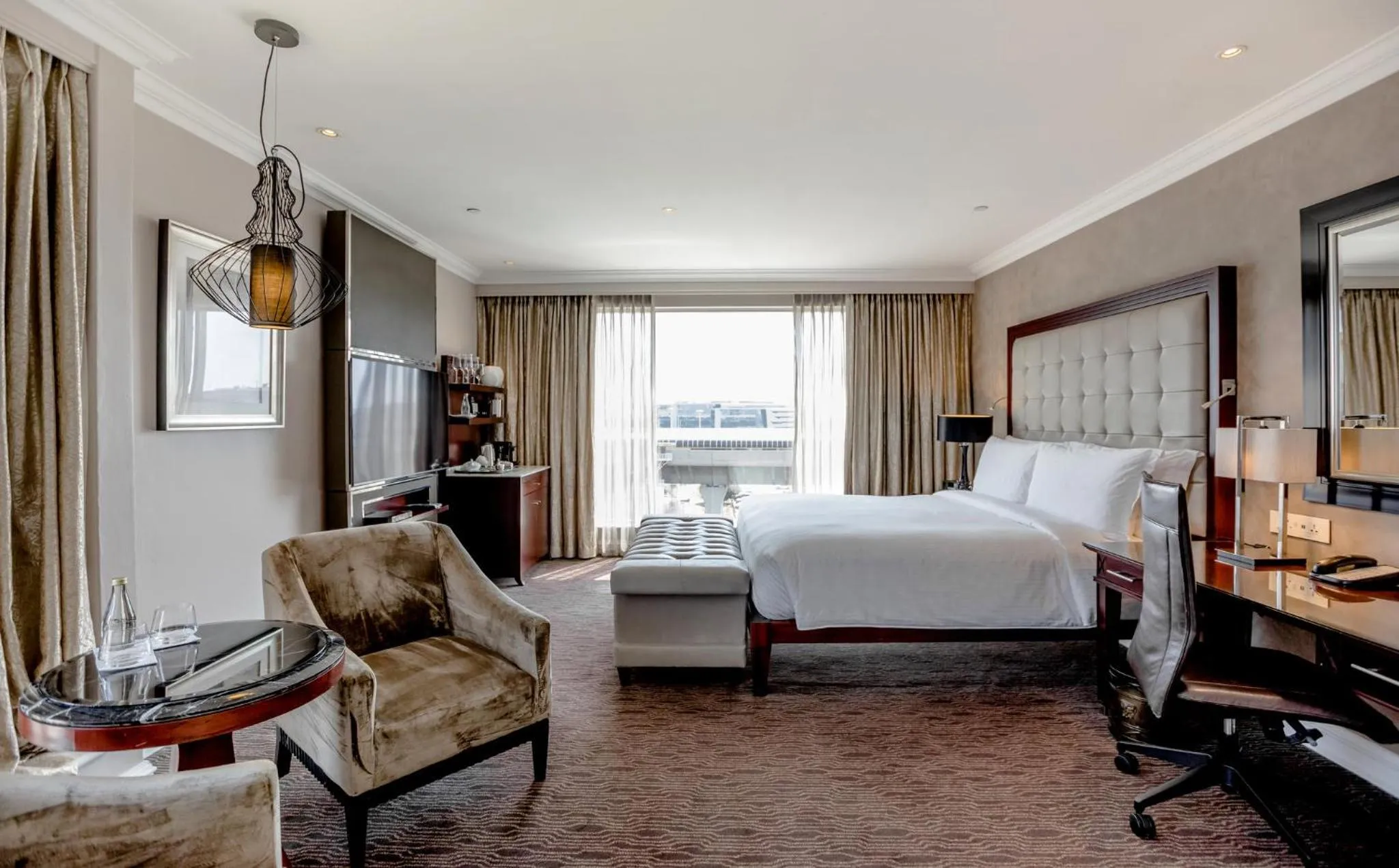Photo of the whole room, Bed in InterContinental Johannesburg OR Tambo Airport Hotel by IHG