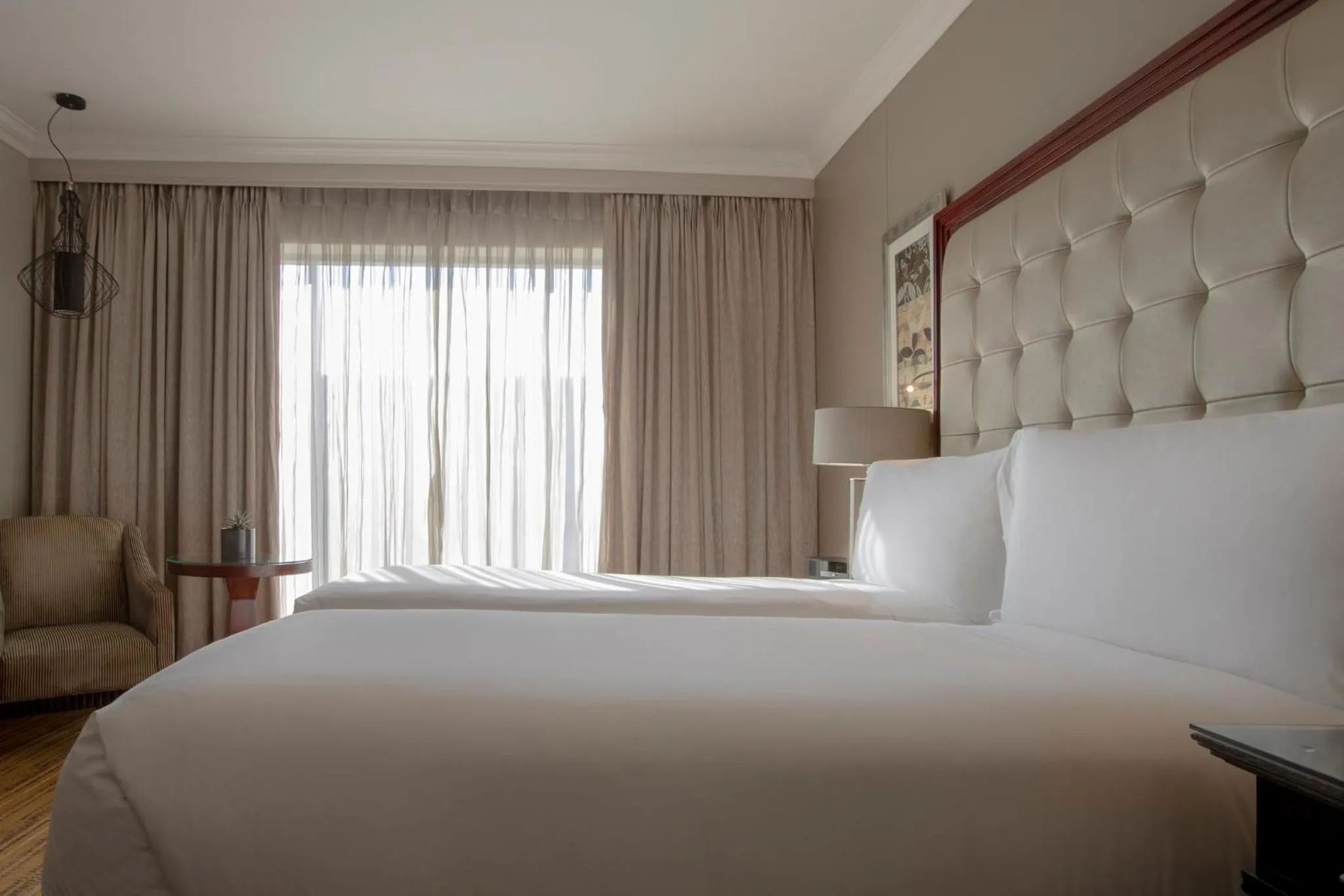 Photo of the whole room, Bed in InterContinental Johannesburg OR Tambo Airport Hotel by IHG