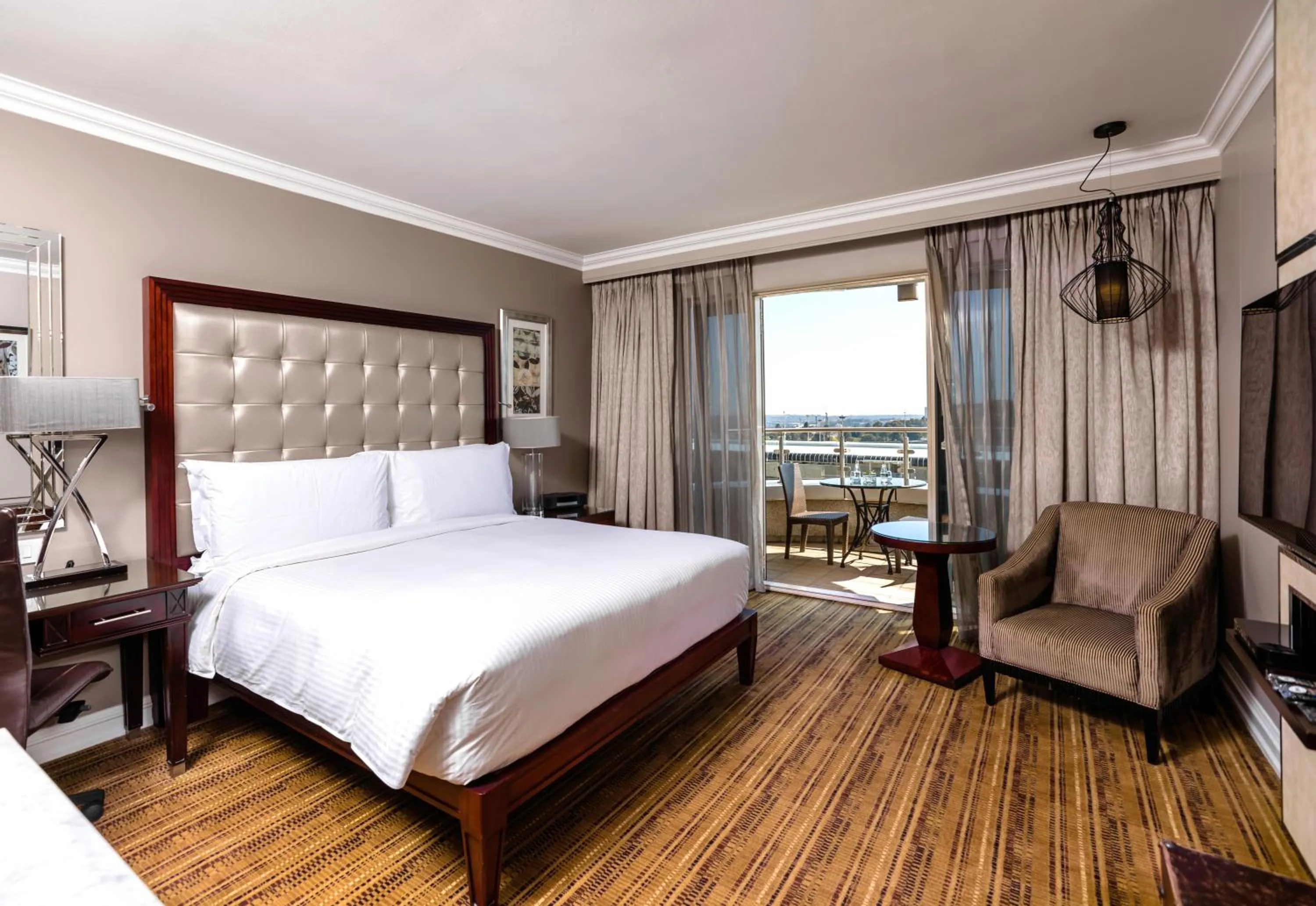 Patio, Bed in InterContinental Johannesburg OR Tambo Airport Hotel by IHG