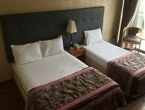 Bed in Charles Hotel