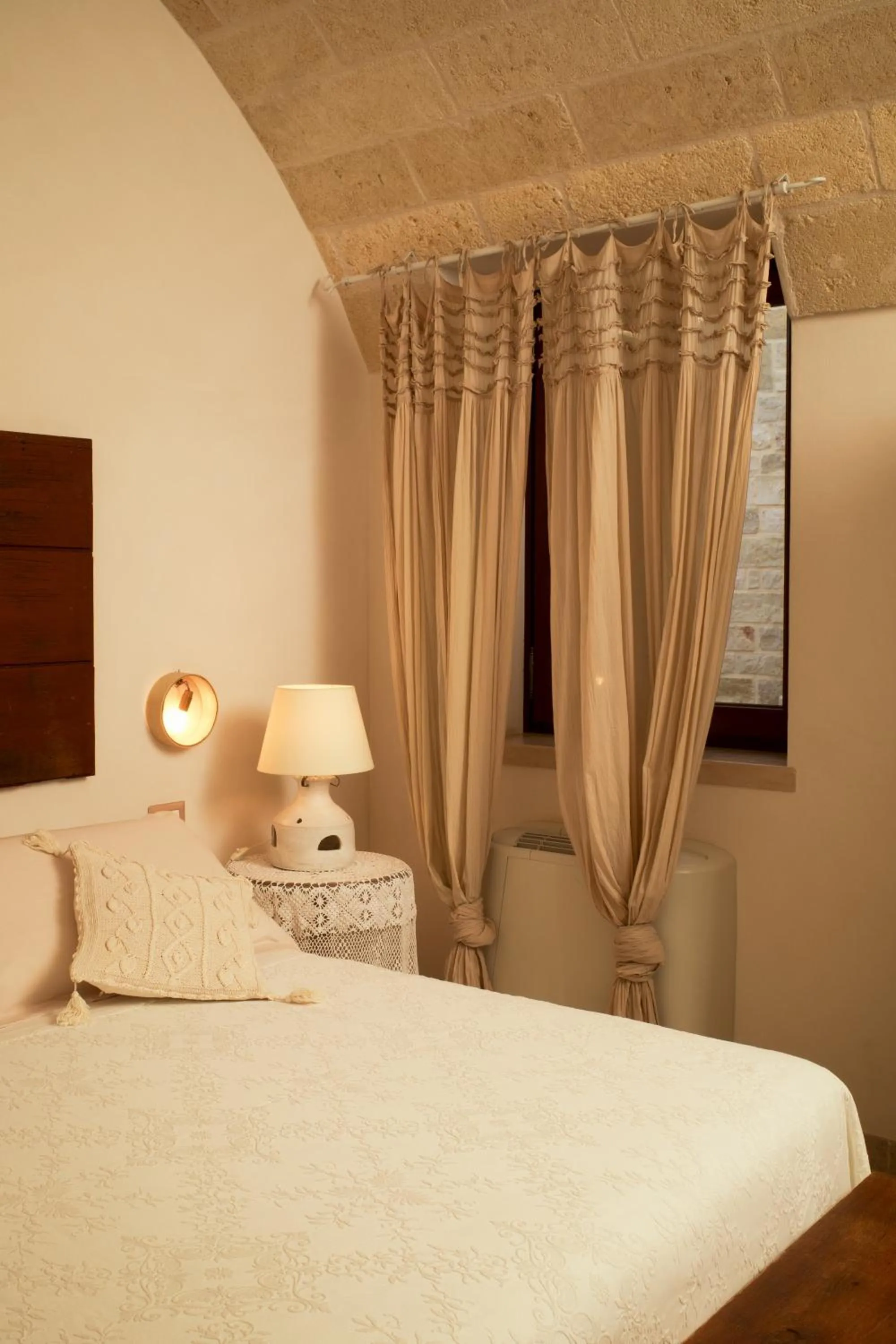 Bed in I Trulli del Tupparello