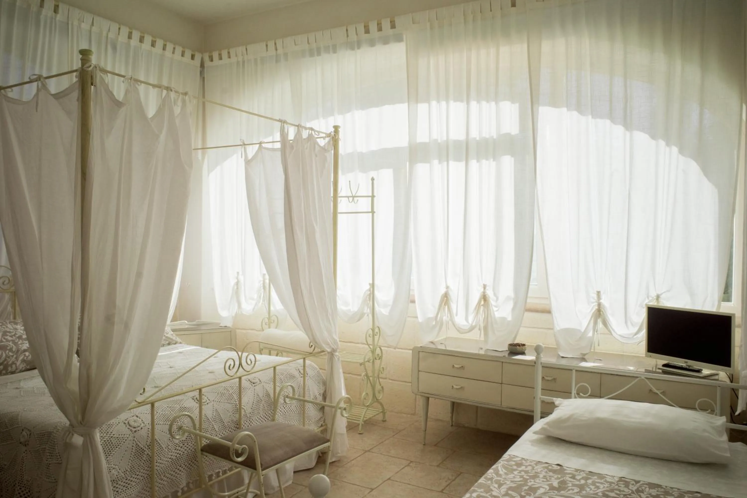 Bed in I Trulli del Tupparello