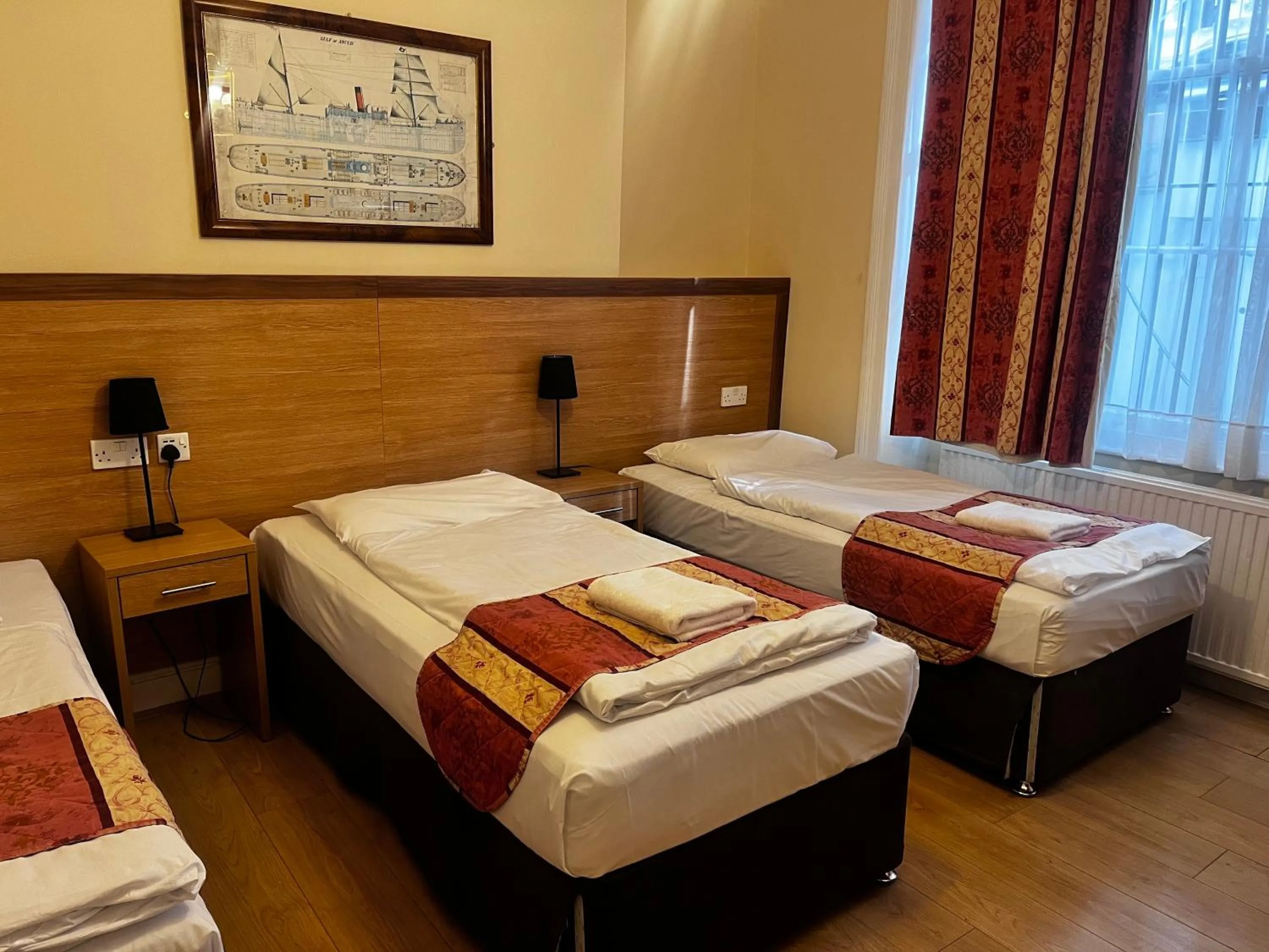 Bed in Shakespeare Hotel