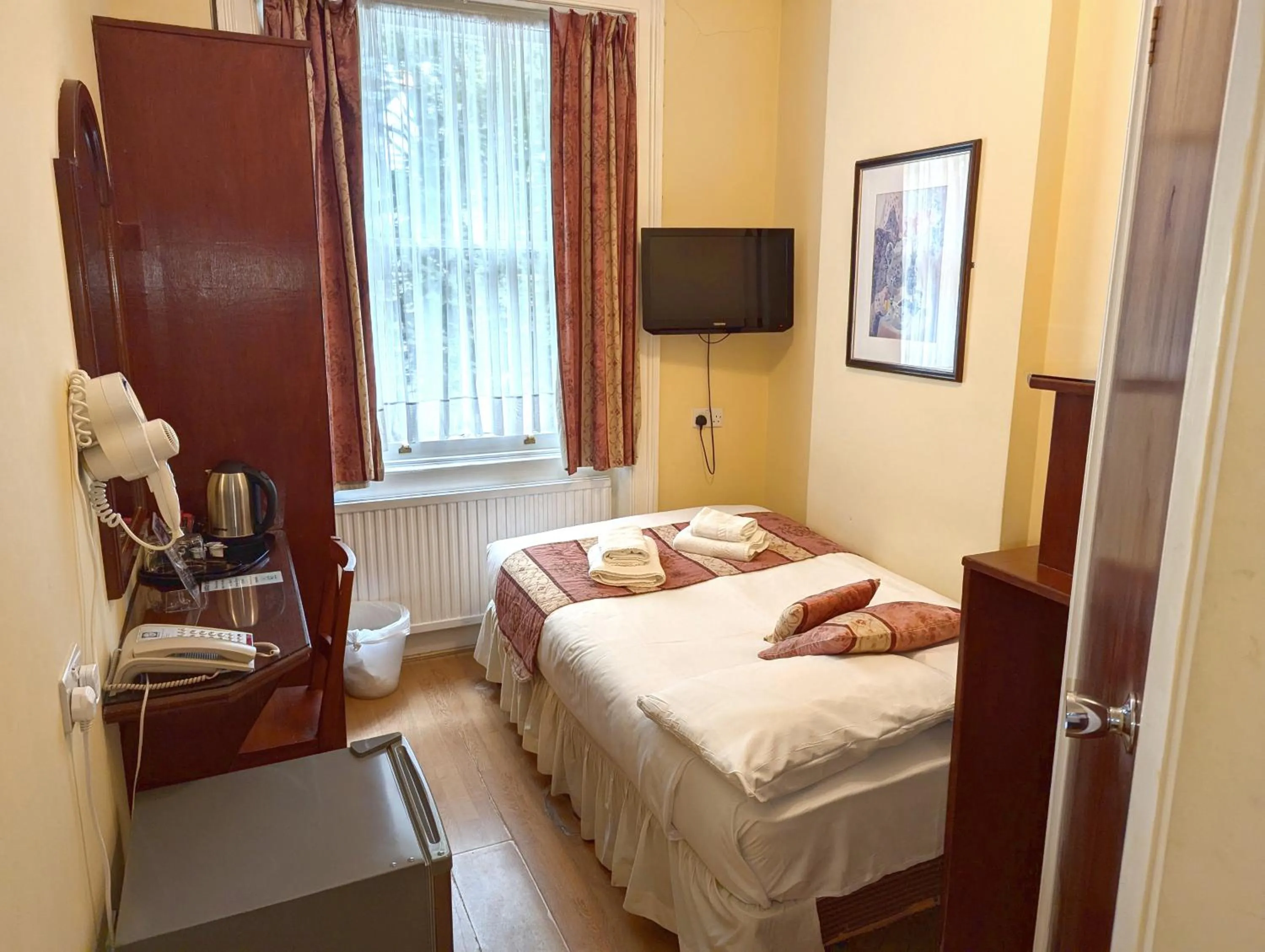 Bed in Shakespeare Hotel