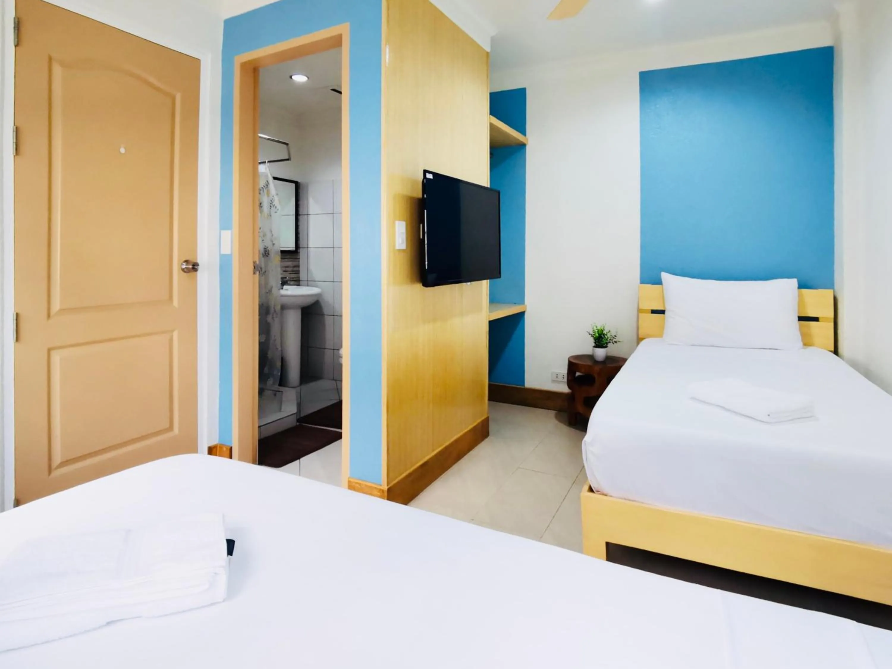 Bed in Den Den Guesthouse