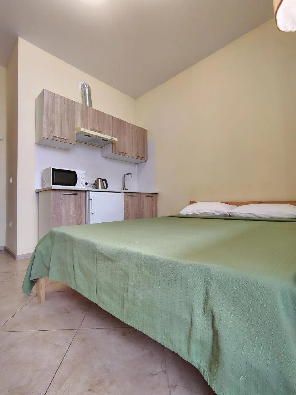 Bed in Orange Guest Rooms