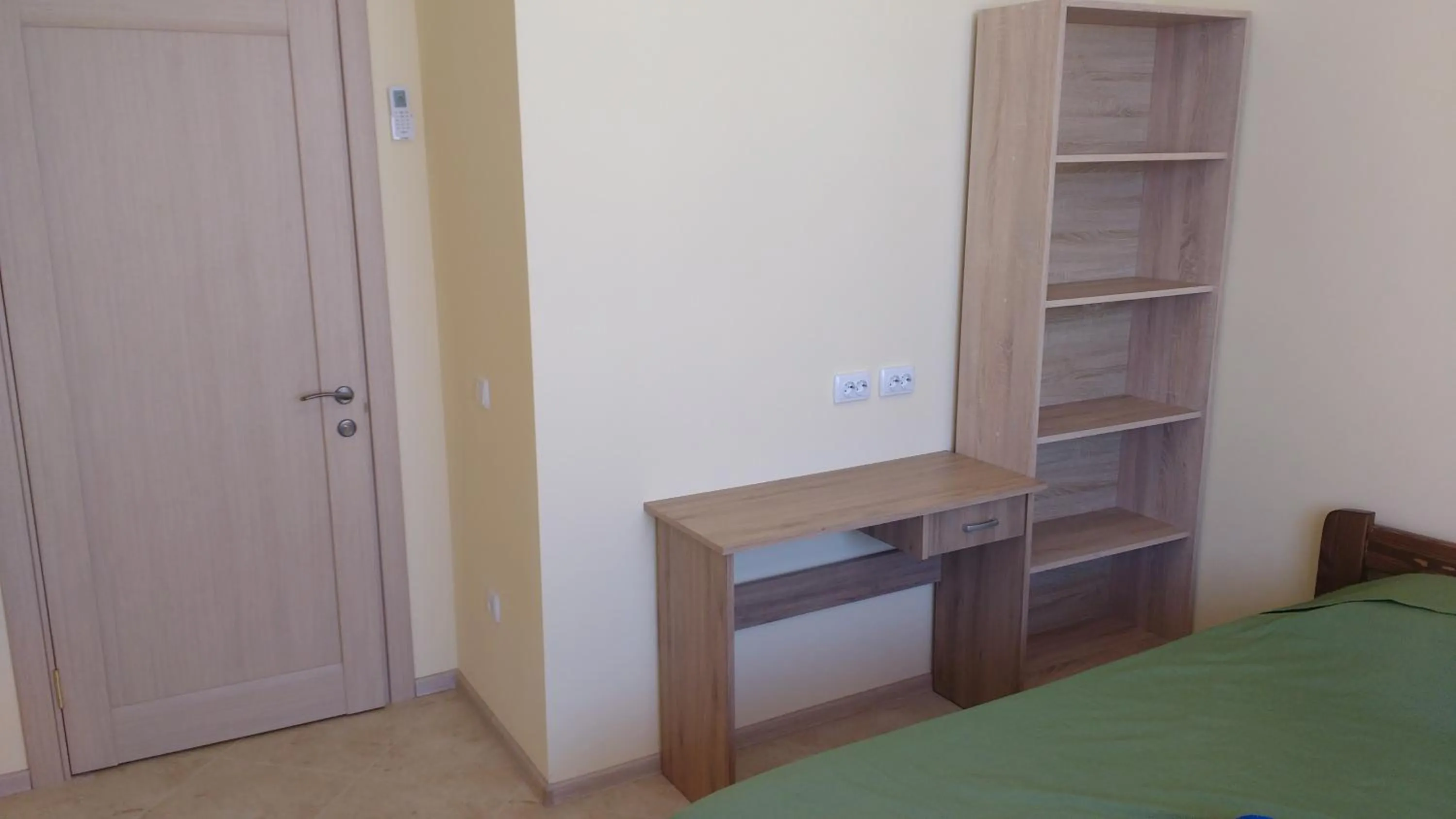 Bed in Orange Guest Rooms