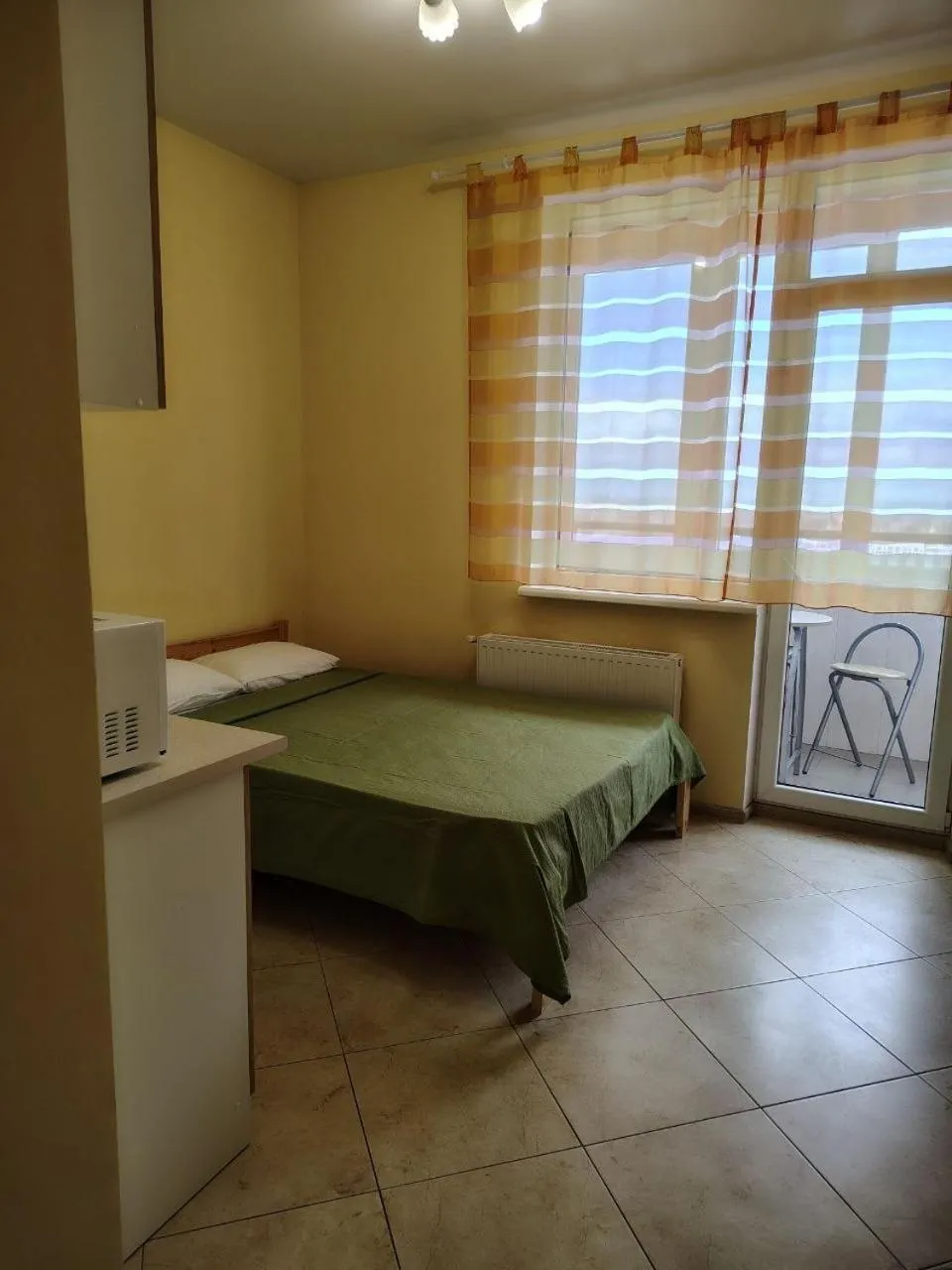 Bed in Orange Guest Rooms