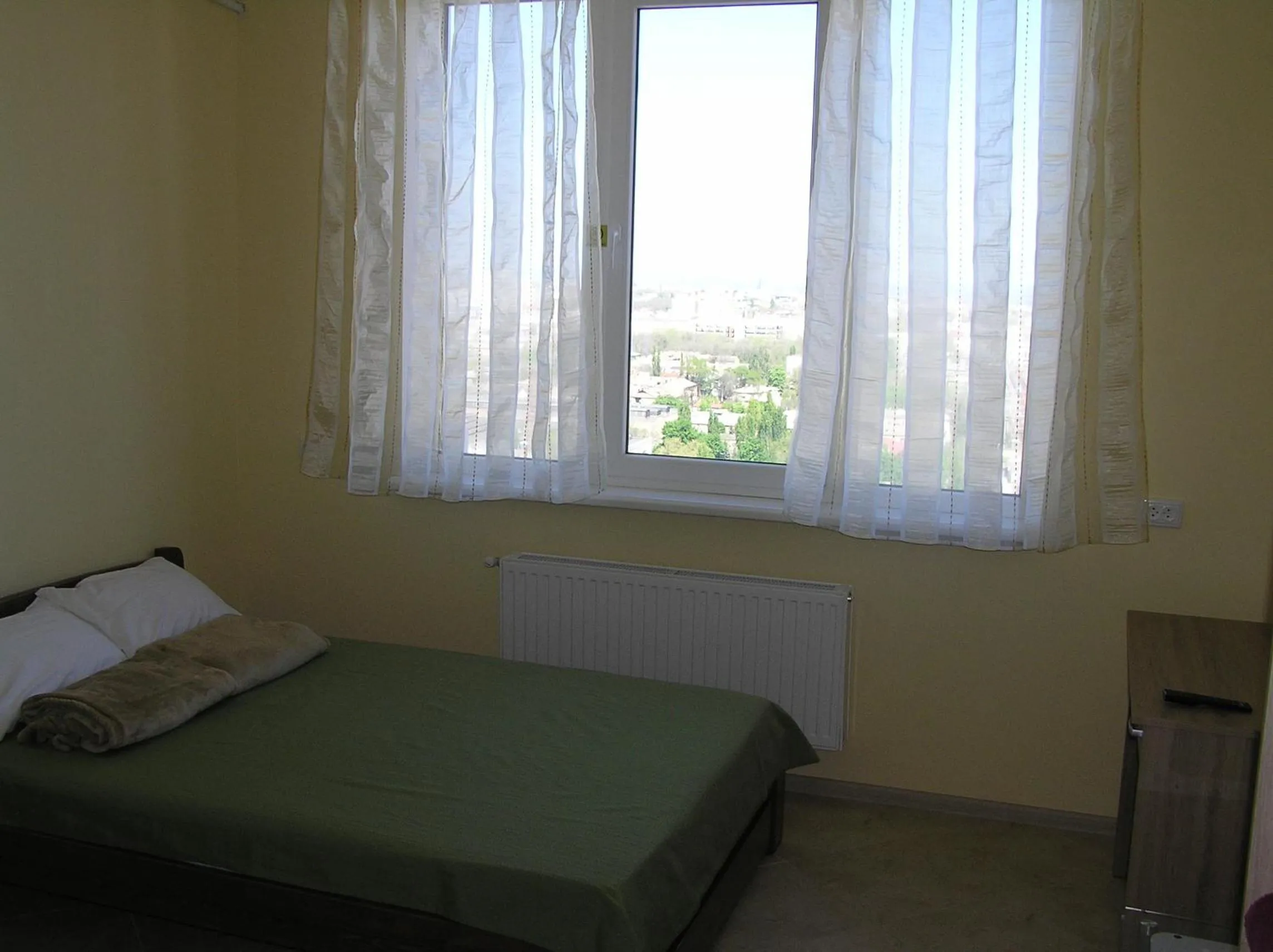 Bed in Orange Guest Rooms
