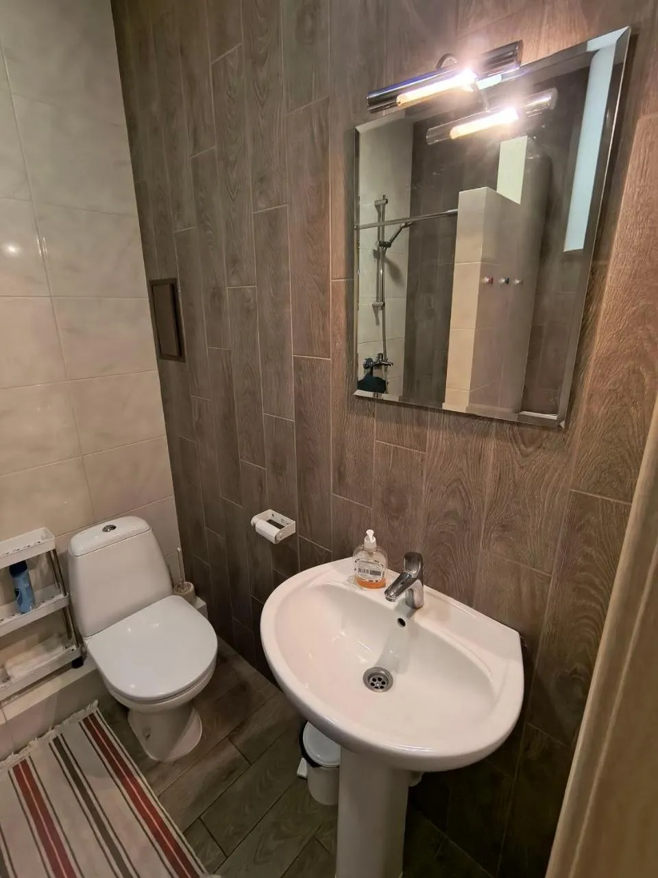 Toilet in Orange Guest Rooms