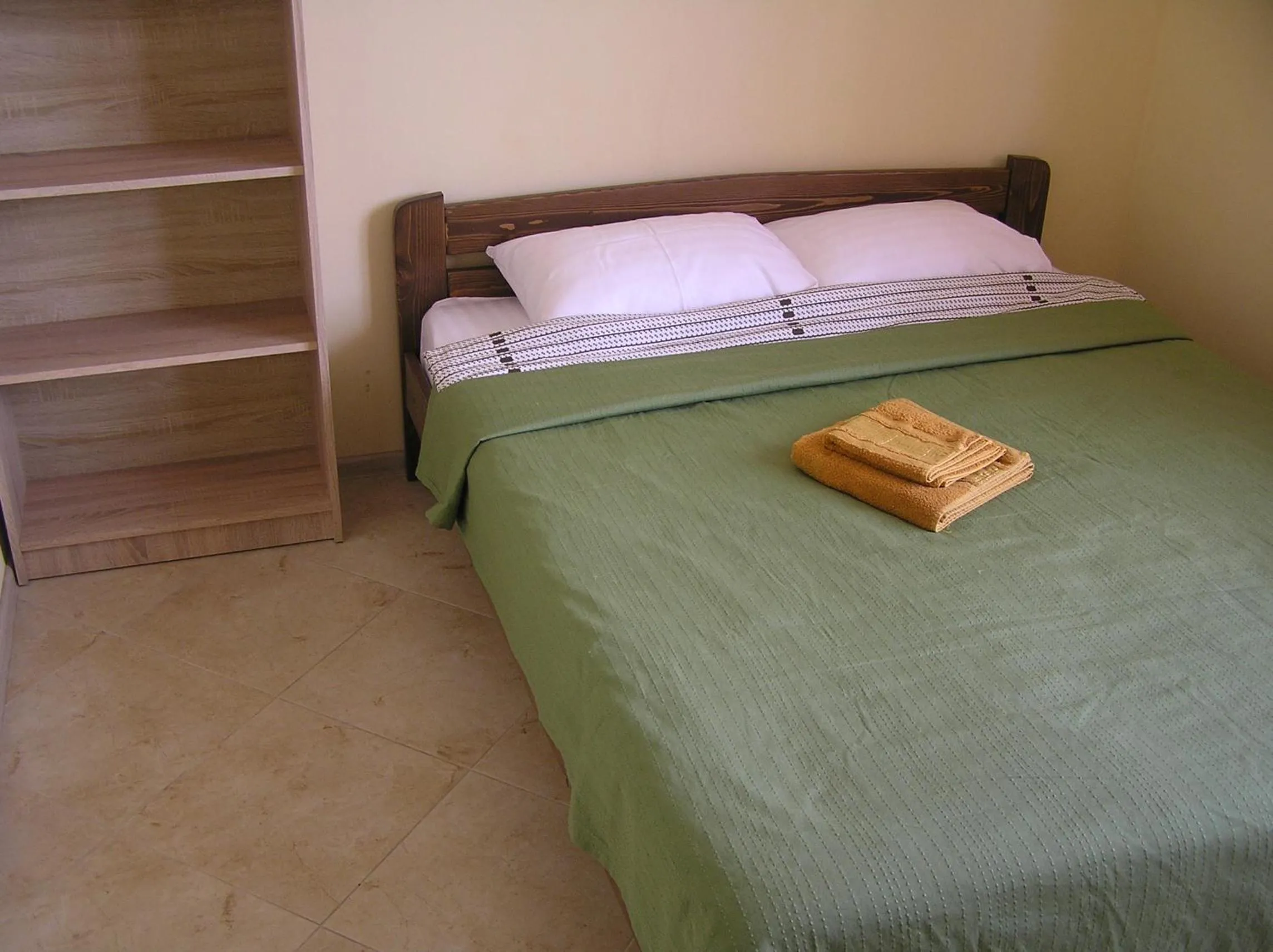 Bed in Orange Guest Rooms