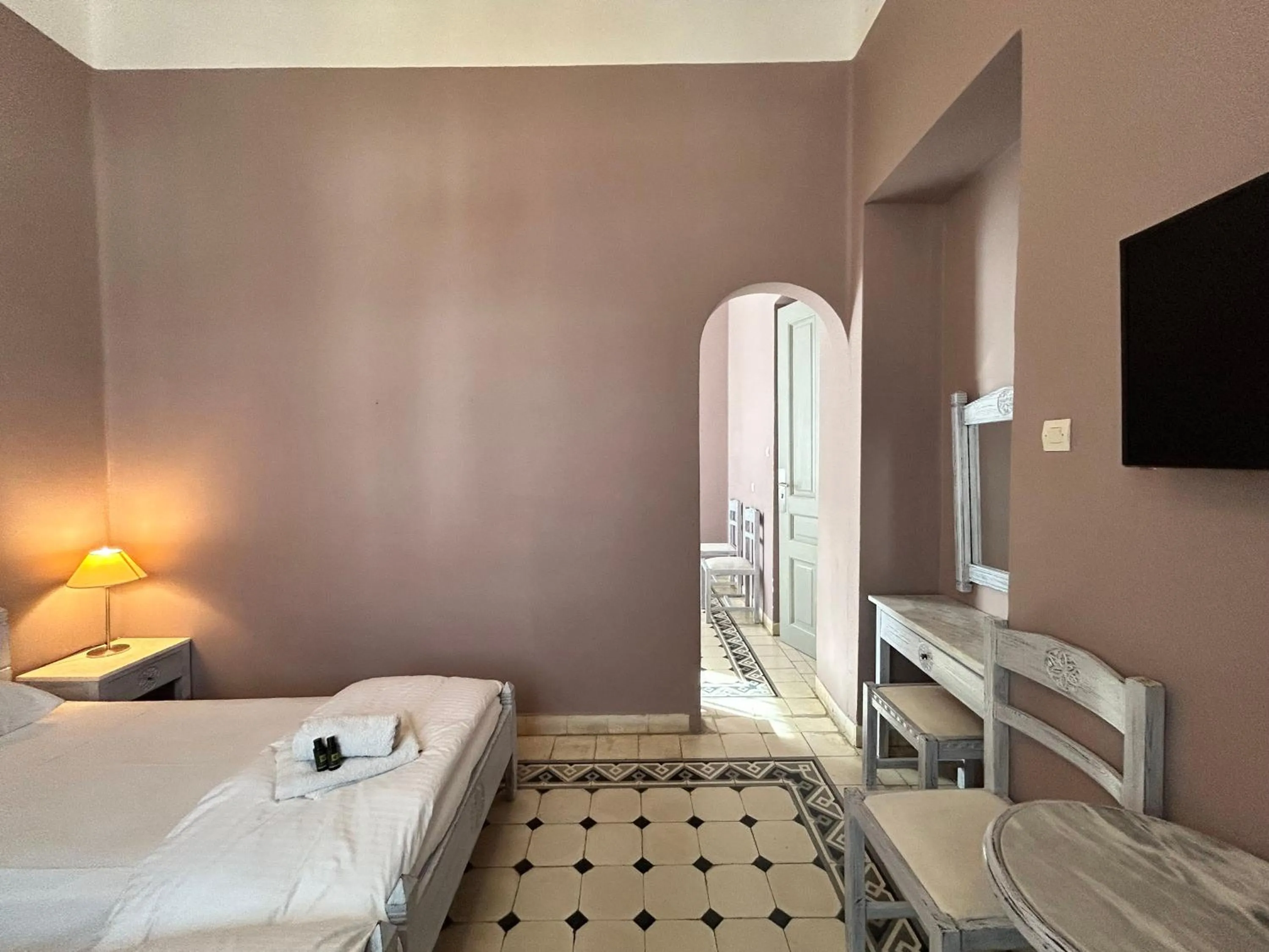 Bed in Tinion Urban Hotel