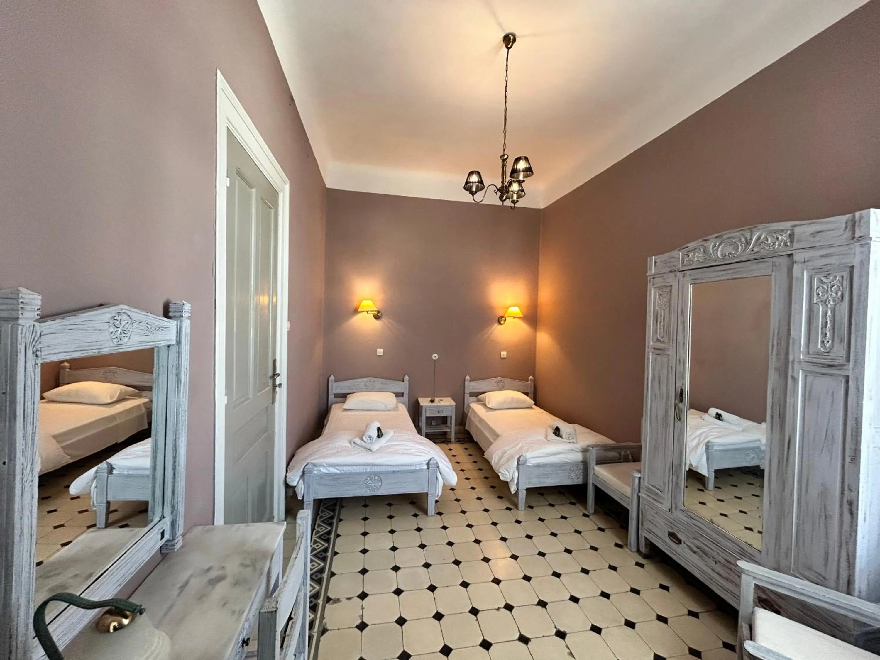 Bed in Tinion Urban Hotel