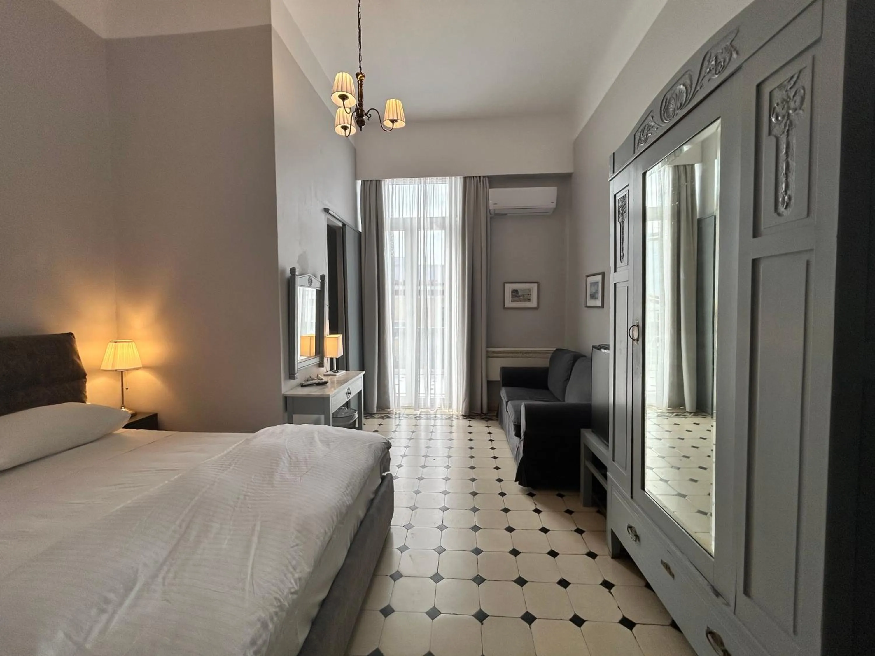 Bed in Tinion Urban Hotel