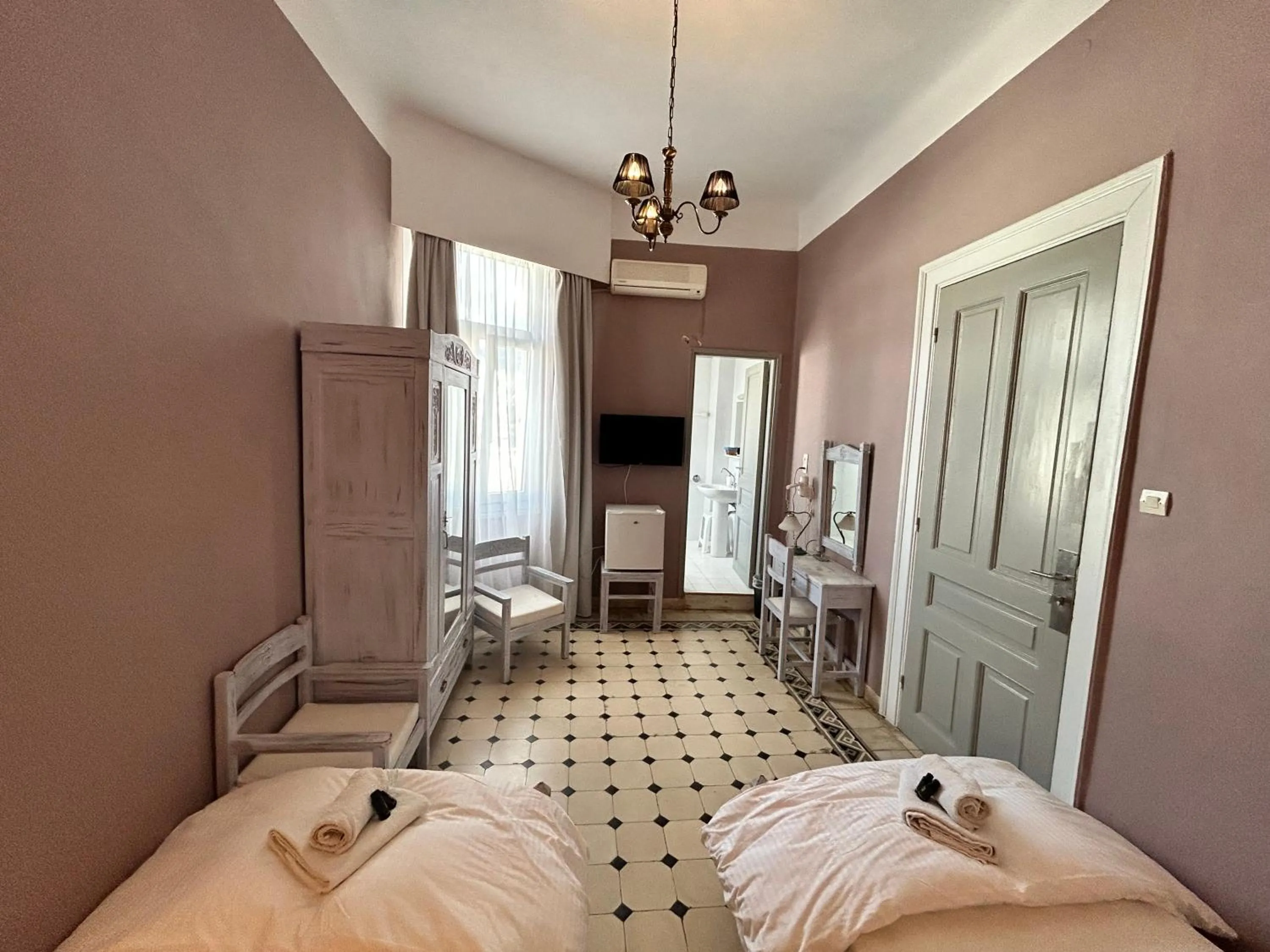 Bedroom in Tinion Urban Hotel