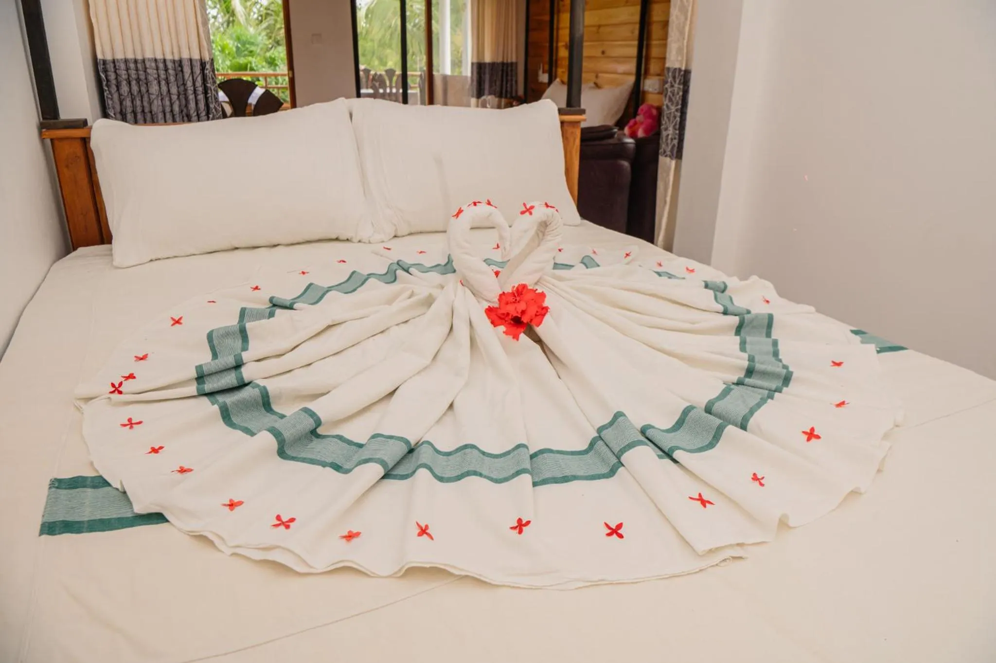 Bed in Rekawa Turtle Gate Hotel