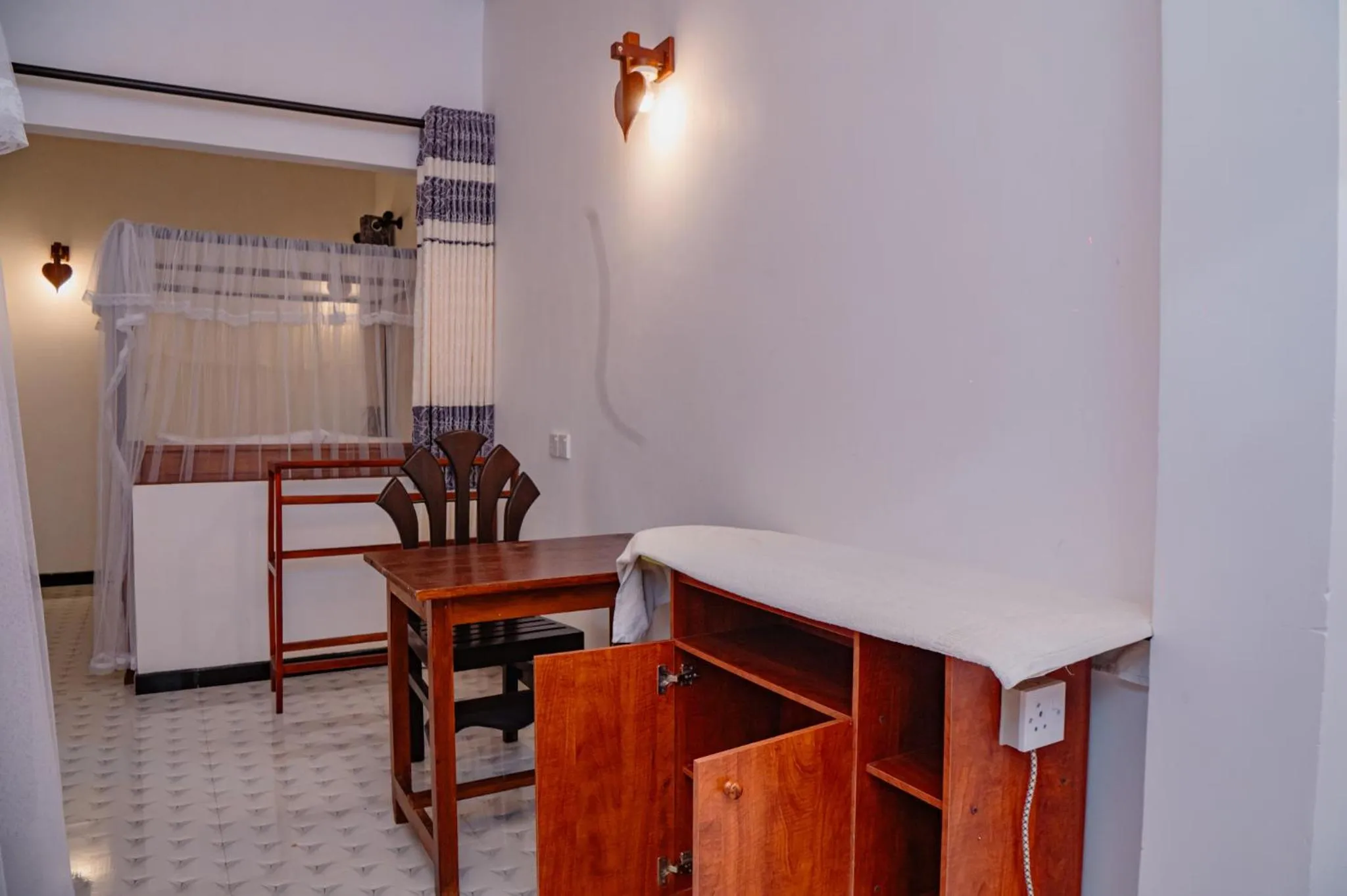 Bed in Rekawa Turtle Gate Hotel