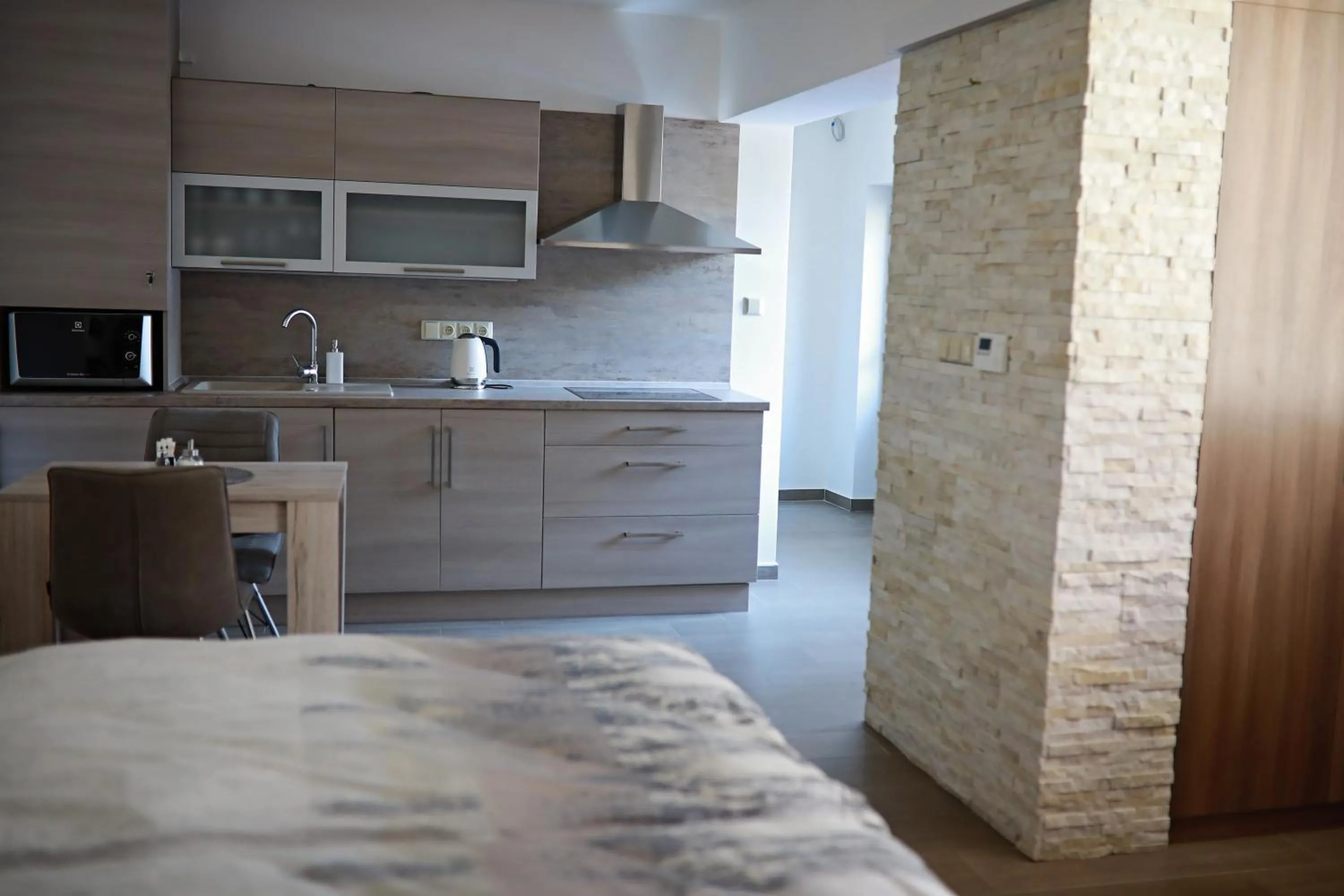 Kitchen or kitchenette, Bed in Penzion Sokolská