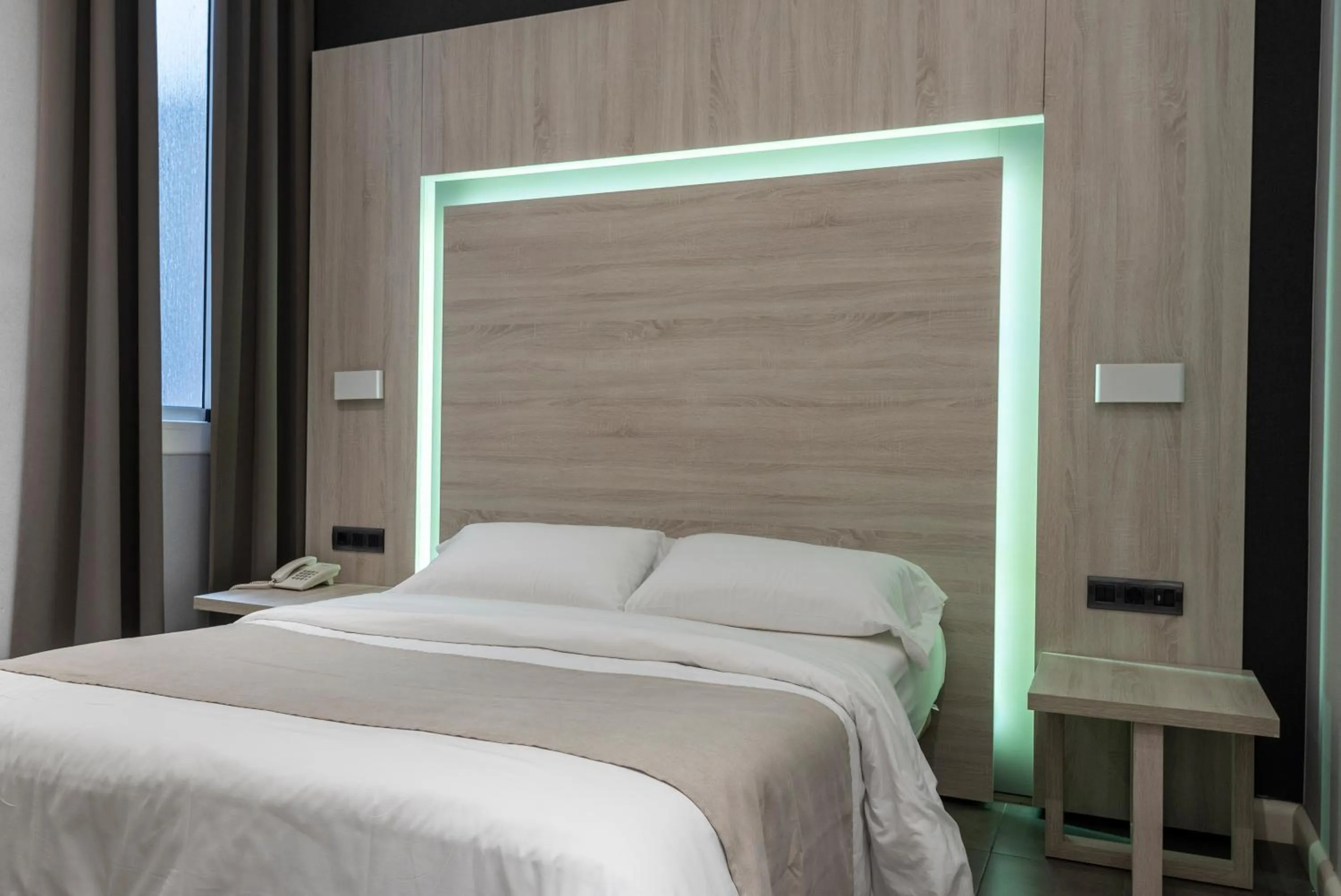 Bed in Plaza Goya Rooms