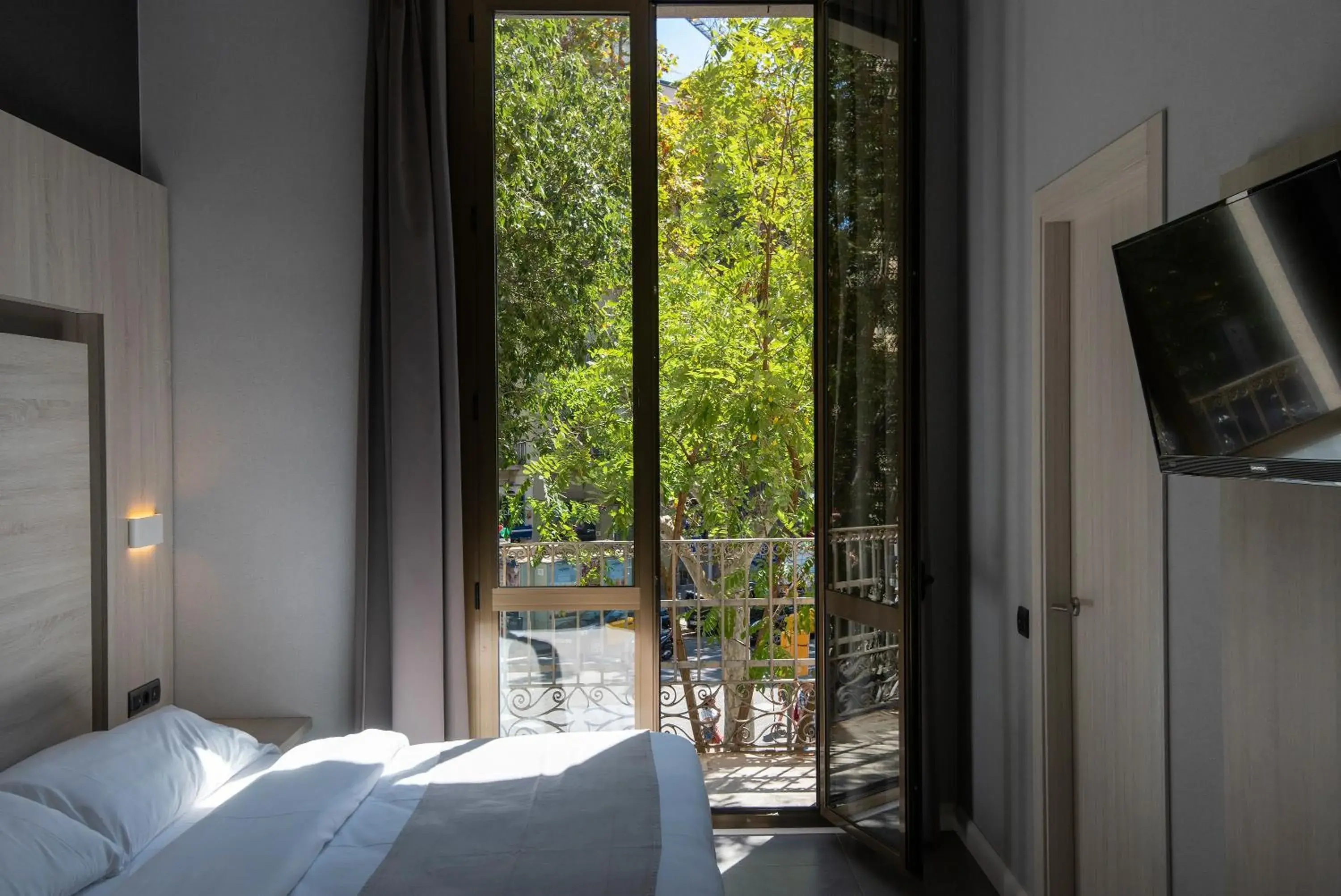 City view, Bed in Plaza Goya Rooms City view, Bed in Plaza Goya Rooms