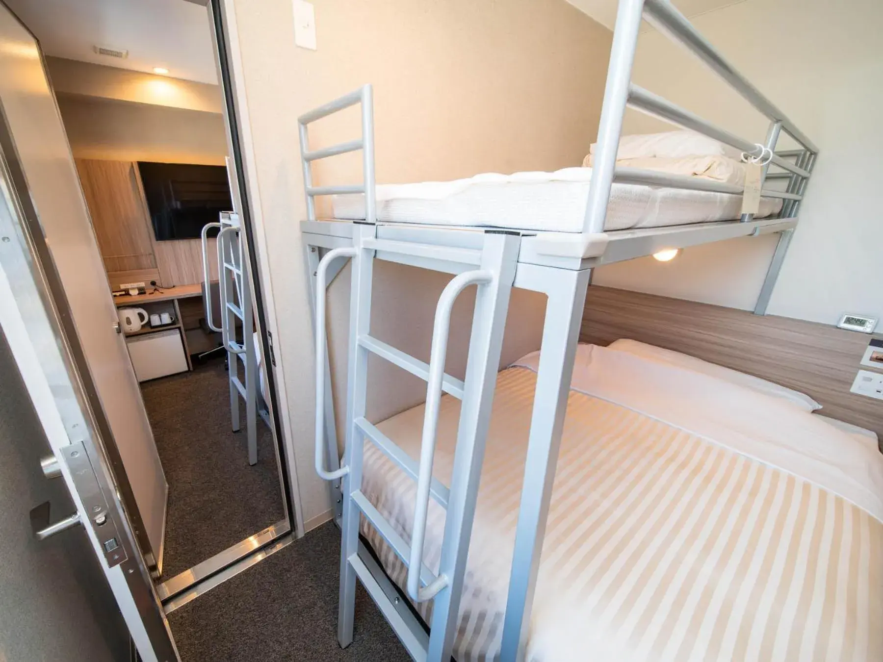 Bed in Super Hotel Premier Musashi Kosugi Ekimae Bed in Super Hotel Premier Musashi Kosugi Ekimae