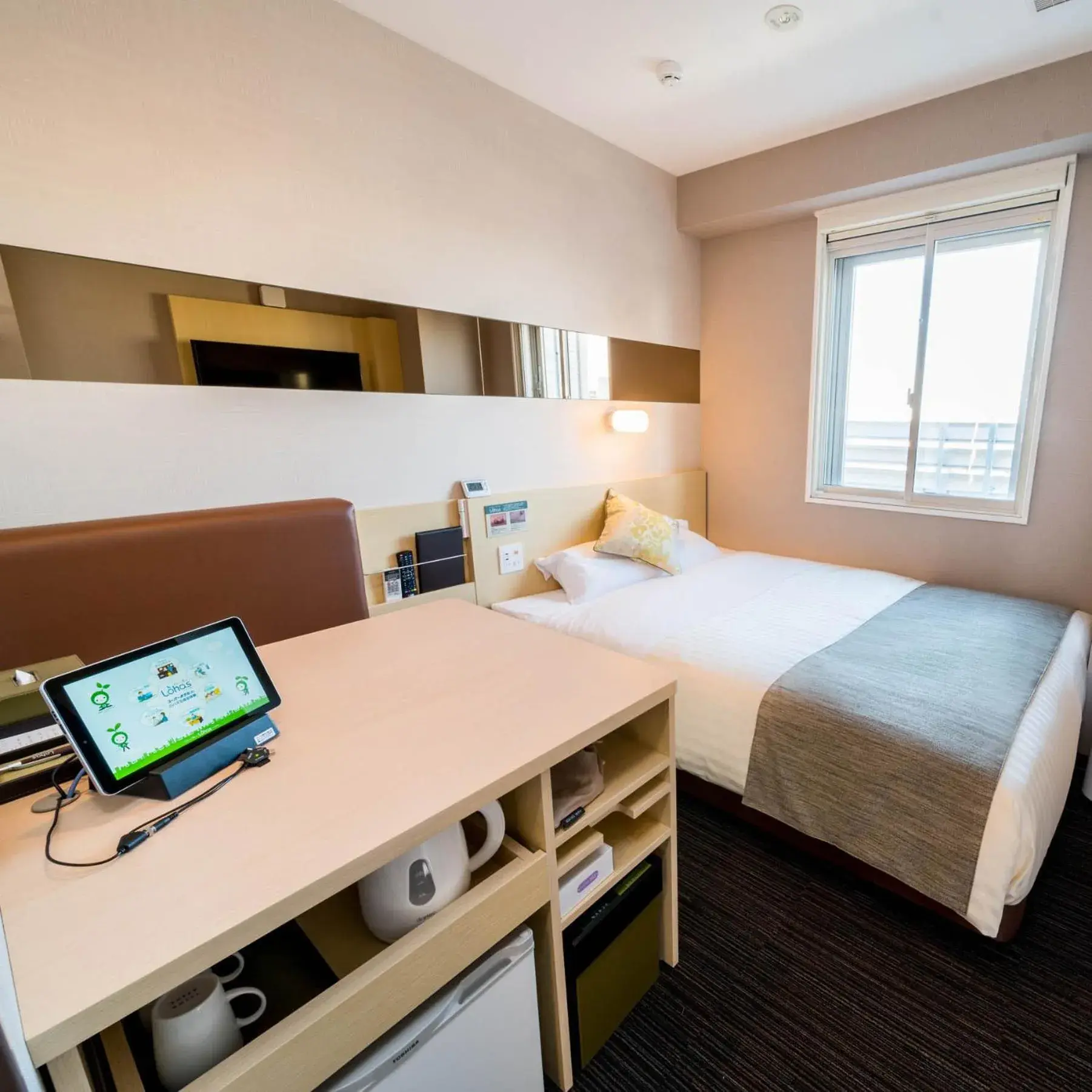 Bed in Super Hotel Premier Musashi Kosugi Ekimae Bed in Super Hotel Premier Musashi Kosugi Ekimae