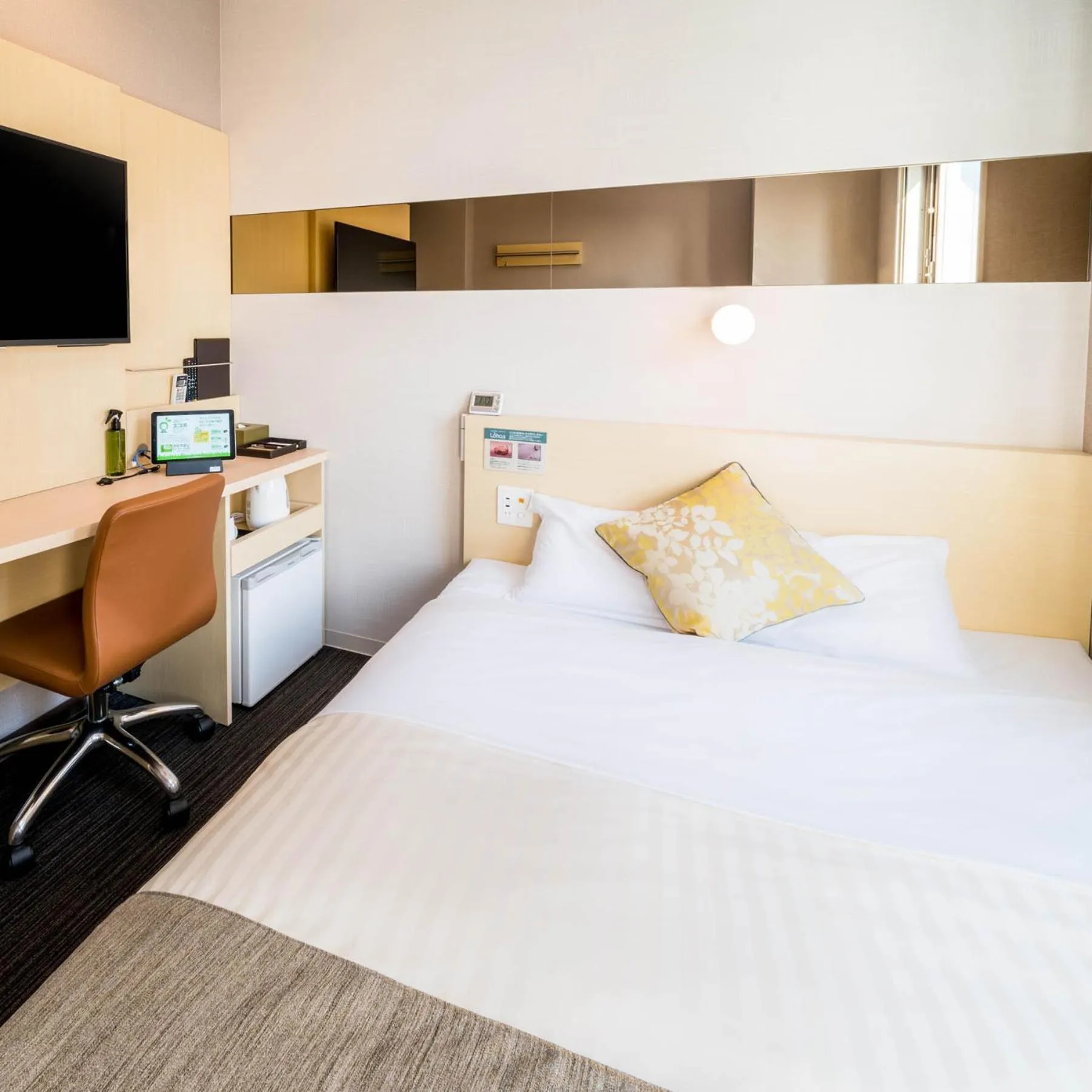 Bed in Super Hotel Premier Musashi Kosugi Ekimae