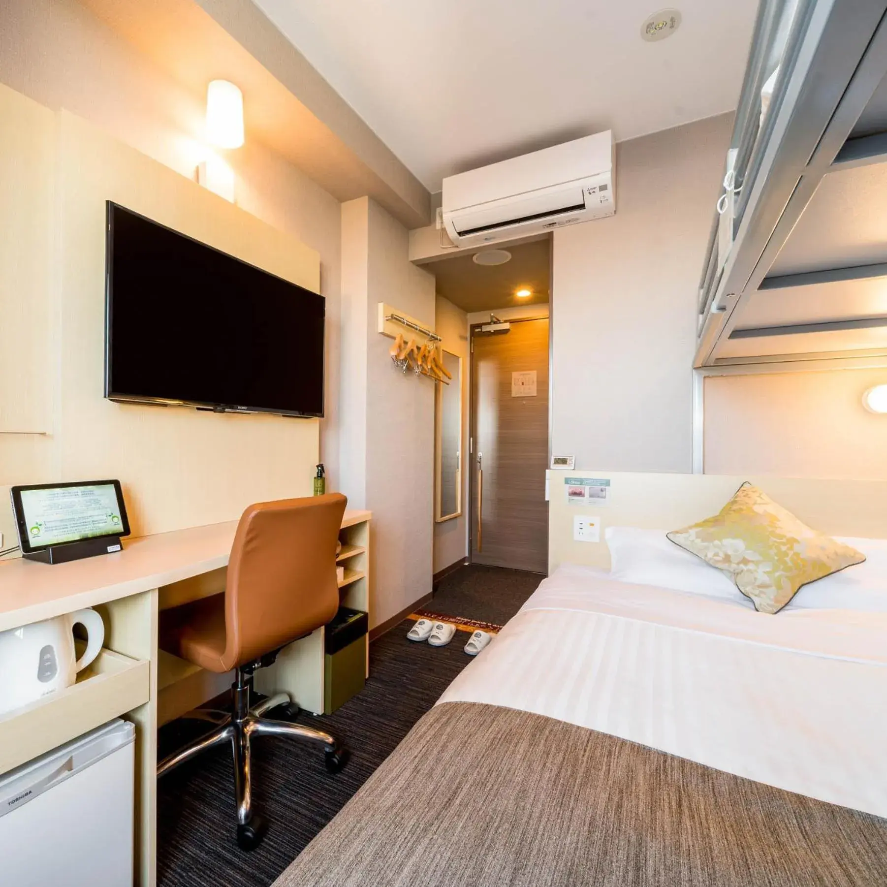 Bed in Super Hotel Premier Musashi Kosugi Ekimae Bed in Super Hotel Premier Musashi Kosugi Ekimae