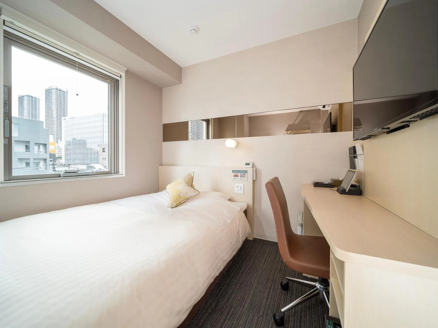 Bed in Super Hotel Premier Musashi Kosugi Ekimae