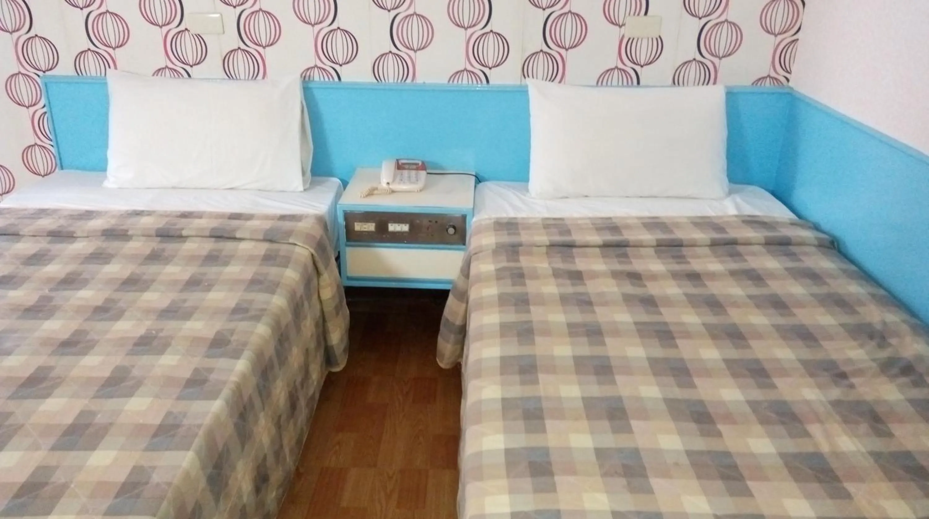 Bed in Reui Chung Hotel