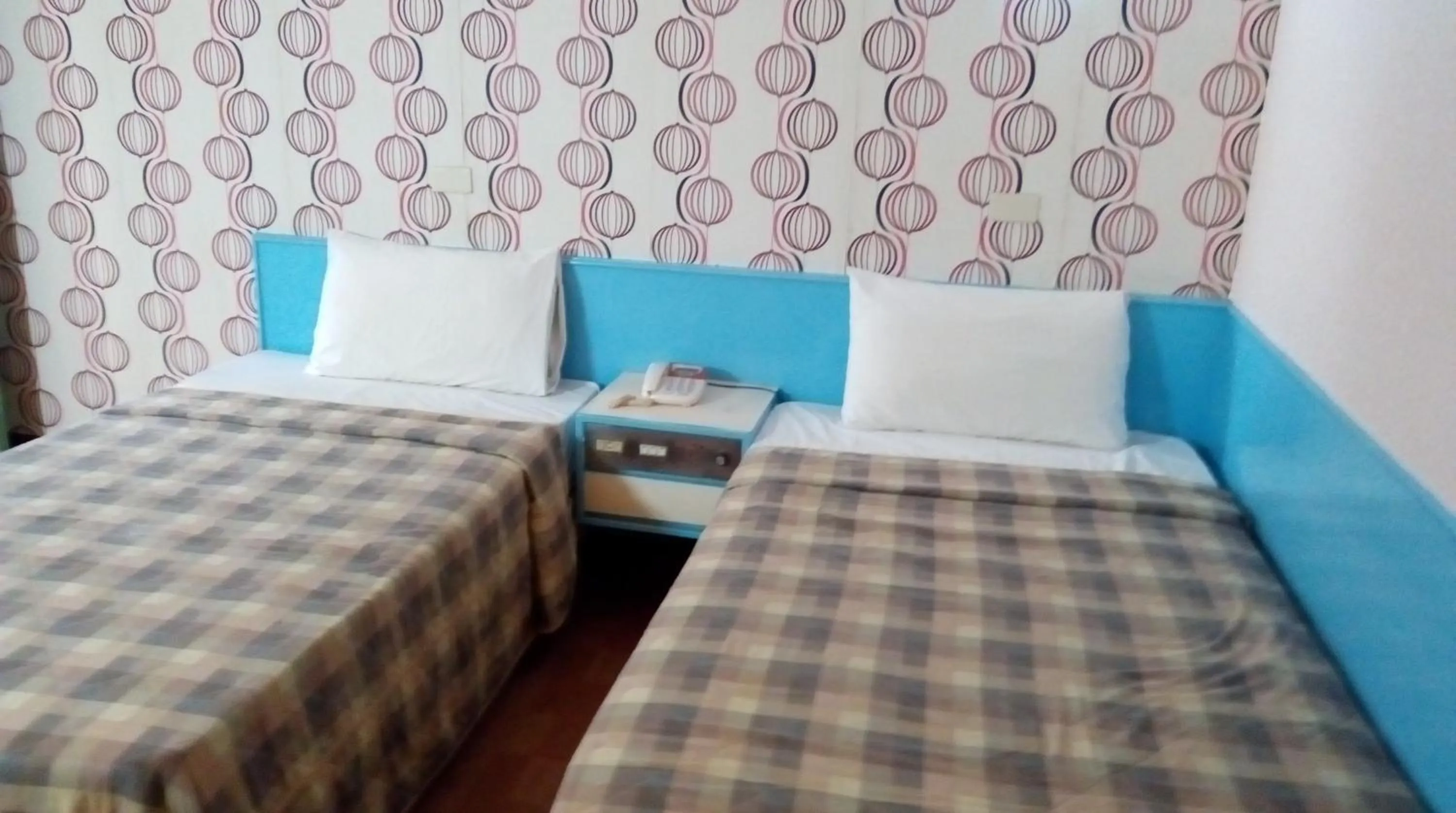 Bed in Reui Chung Hotel