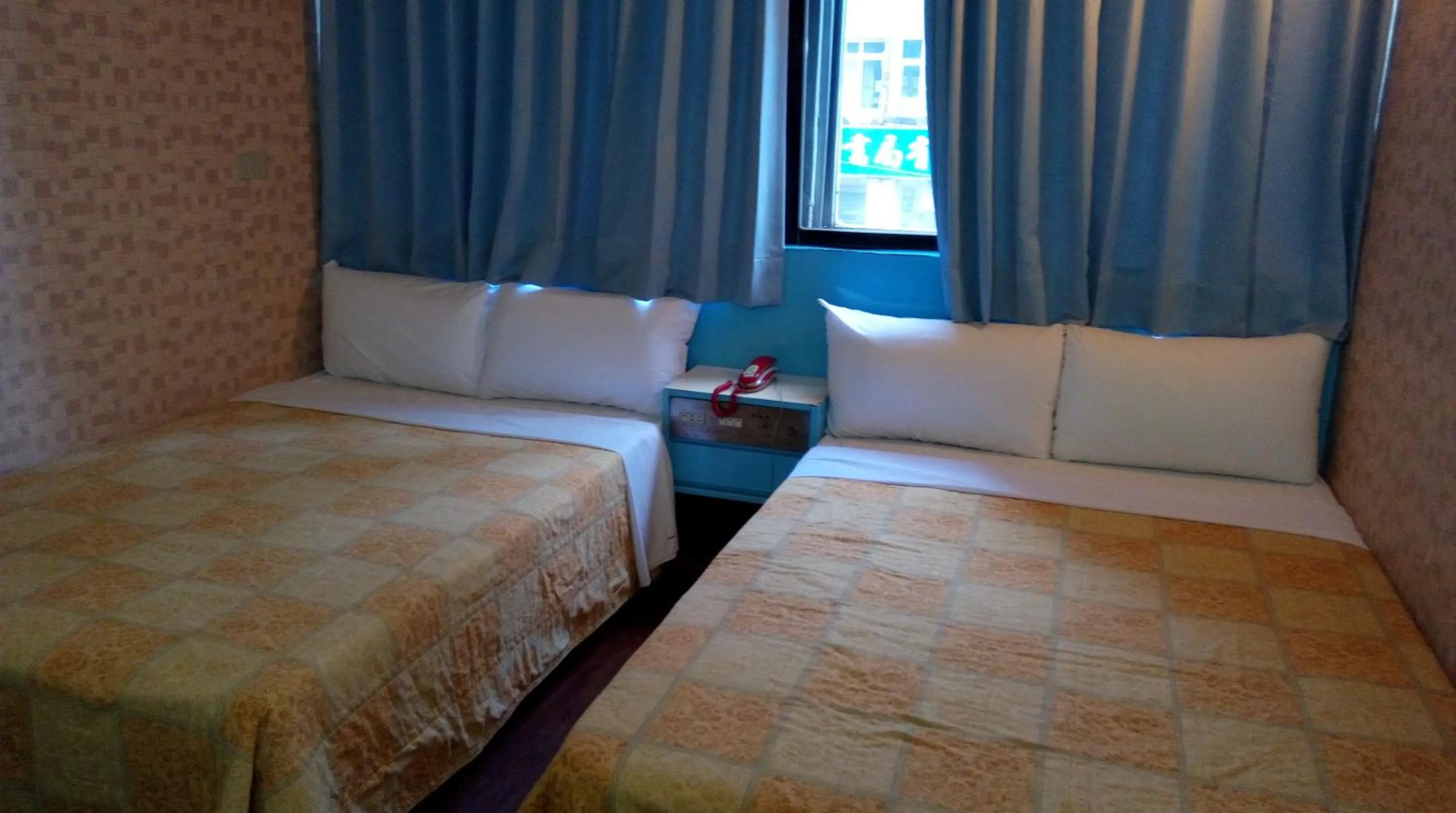 Bed in Reui Chung Hotel