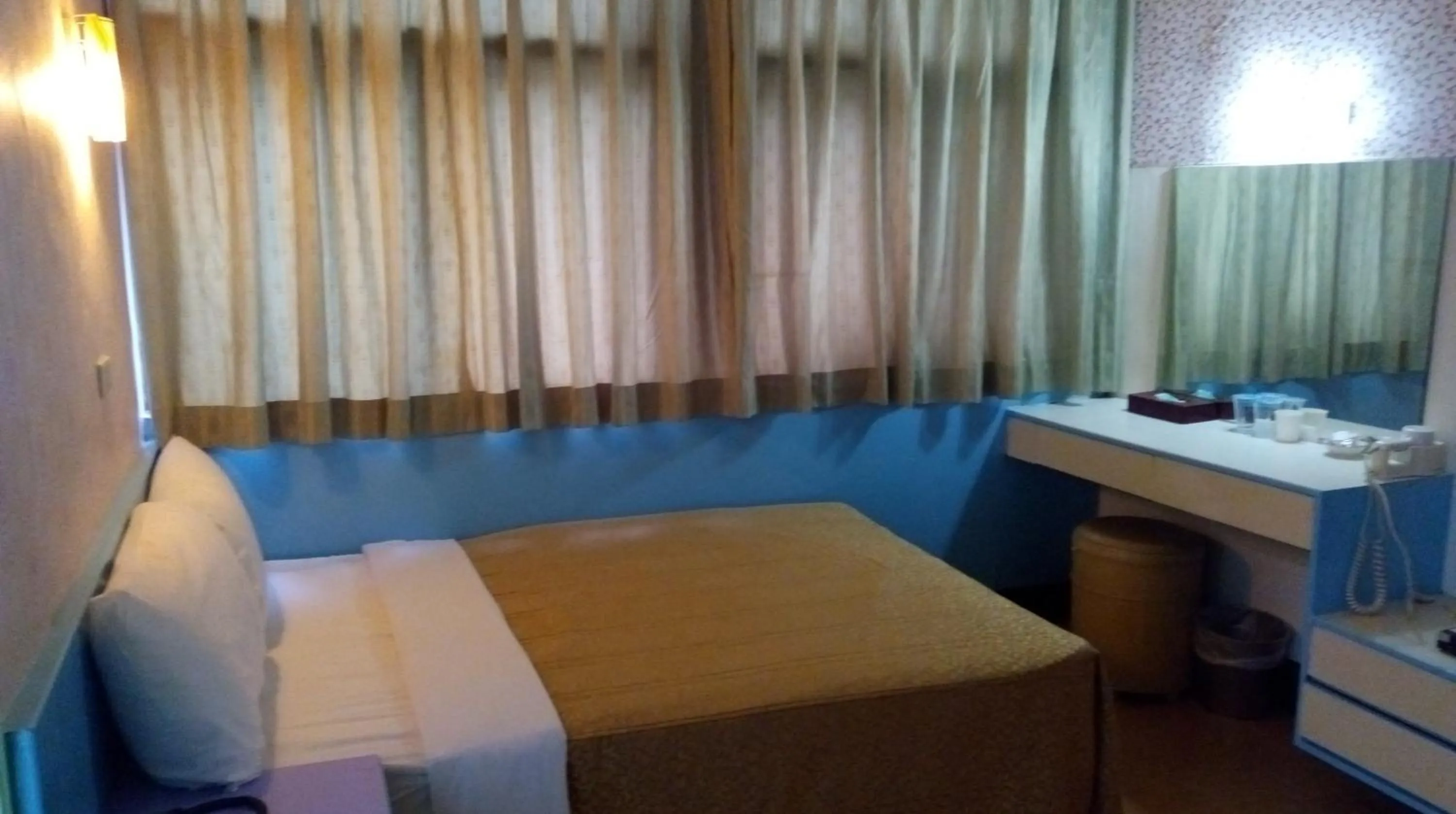 Bed in Reui Chung Hotel