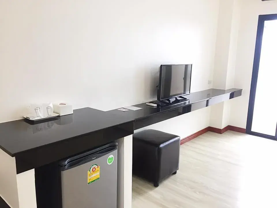 Communal lounge/ TV room in Orchid Riverview Hotel Communal lounge/ TV room in Orchid Riverview Hotel