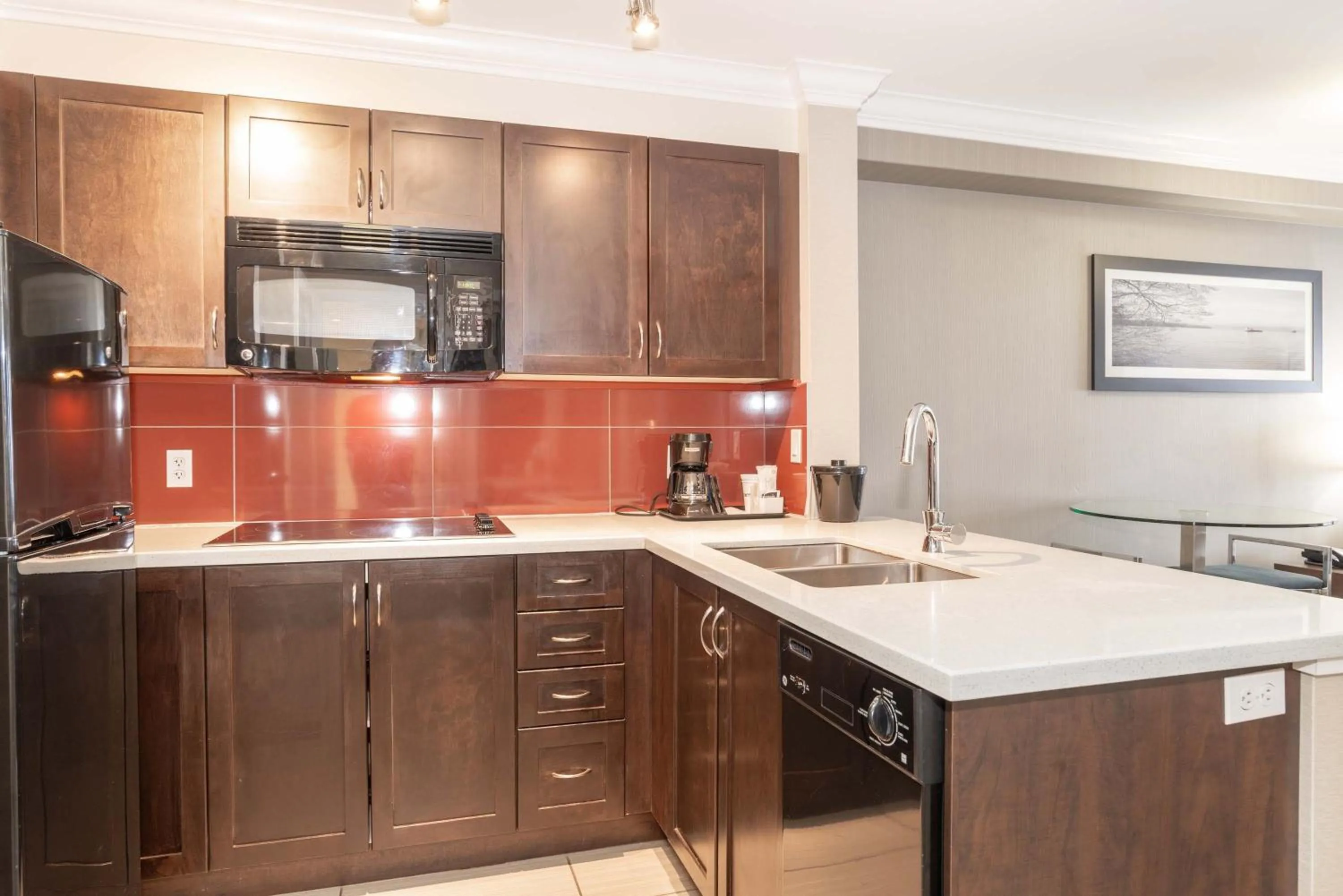 Kitchen or kitchenette in Sandman Hotel and Suites Abbotsford