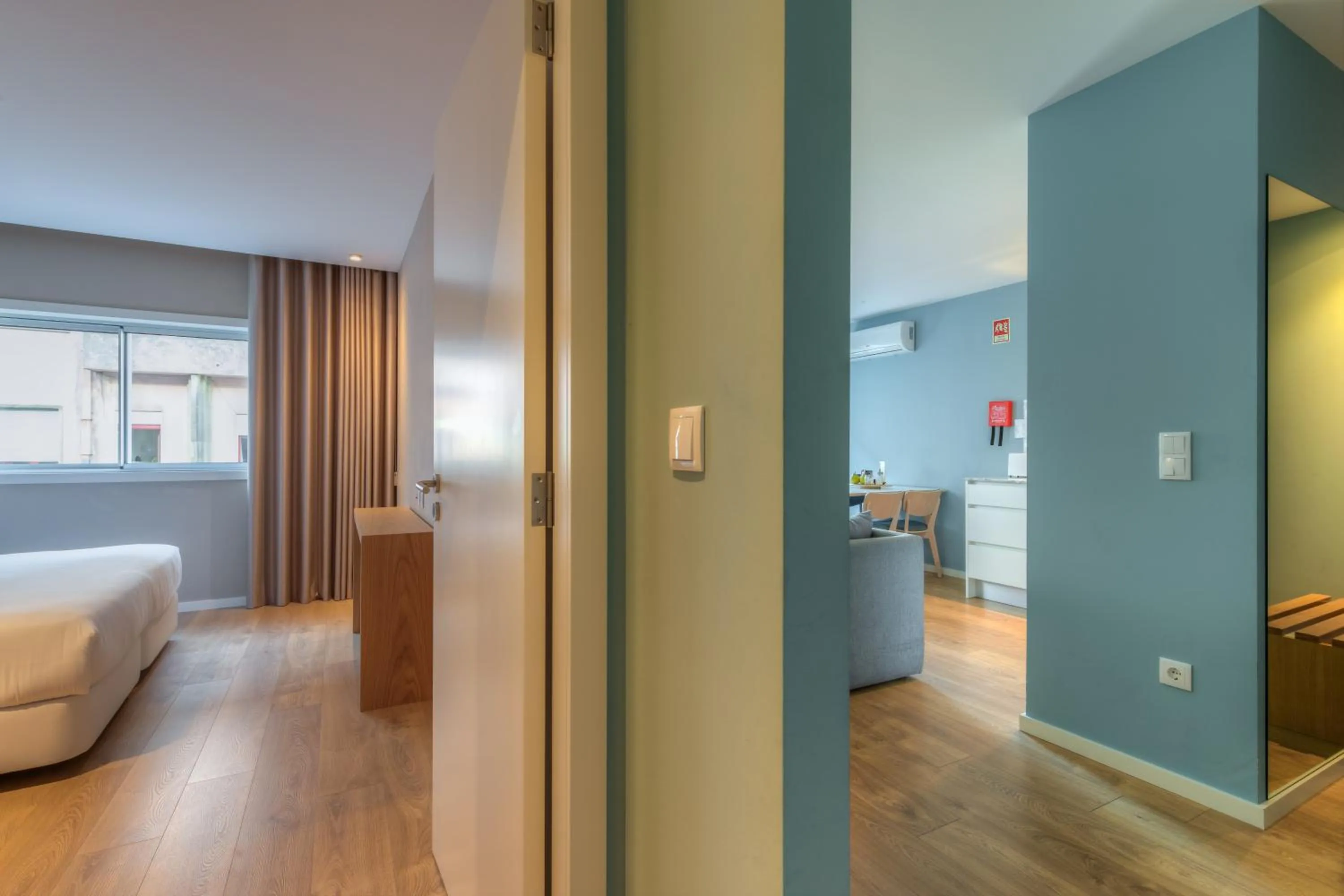 Bed in Spot Family Apartments