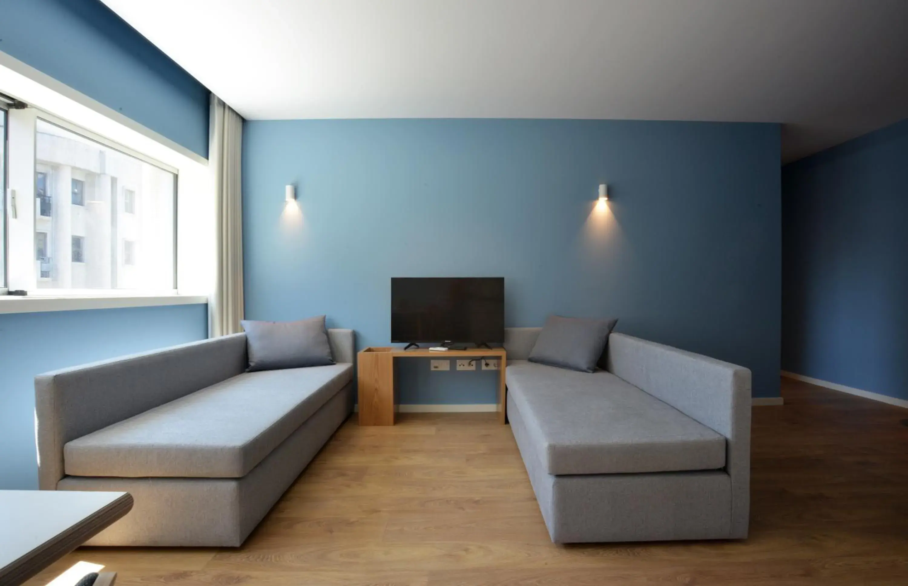 Living room in Spot Family Apartments Living room in Spot Family Apartments