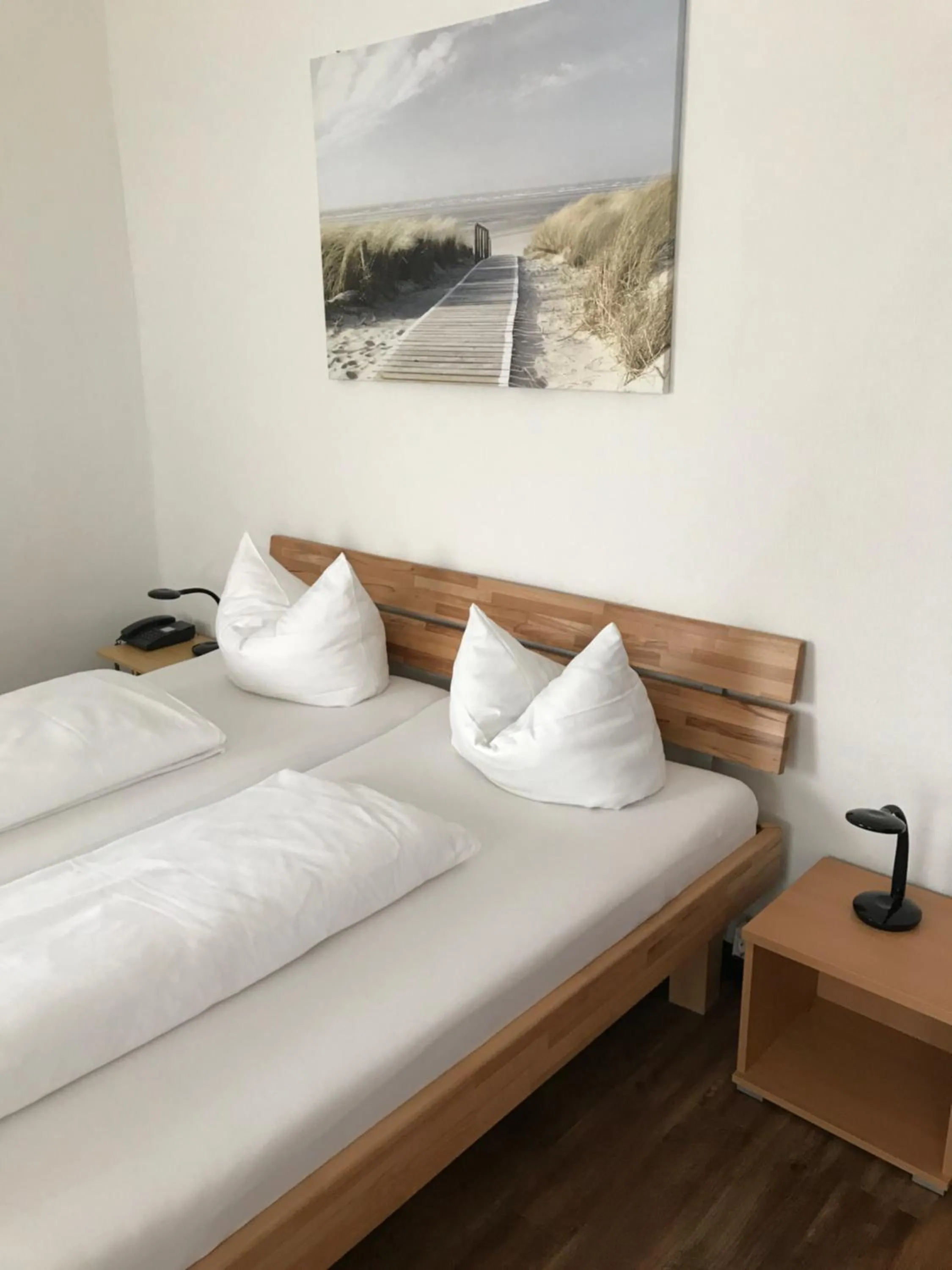 Bed in Hotel Rheinischer Hof