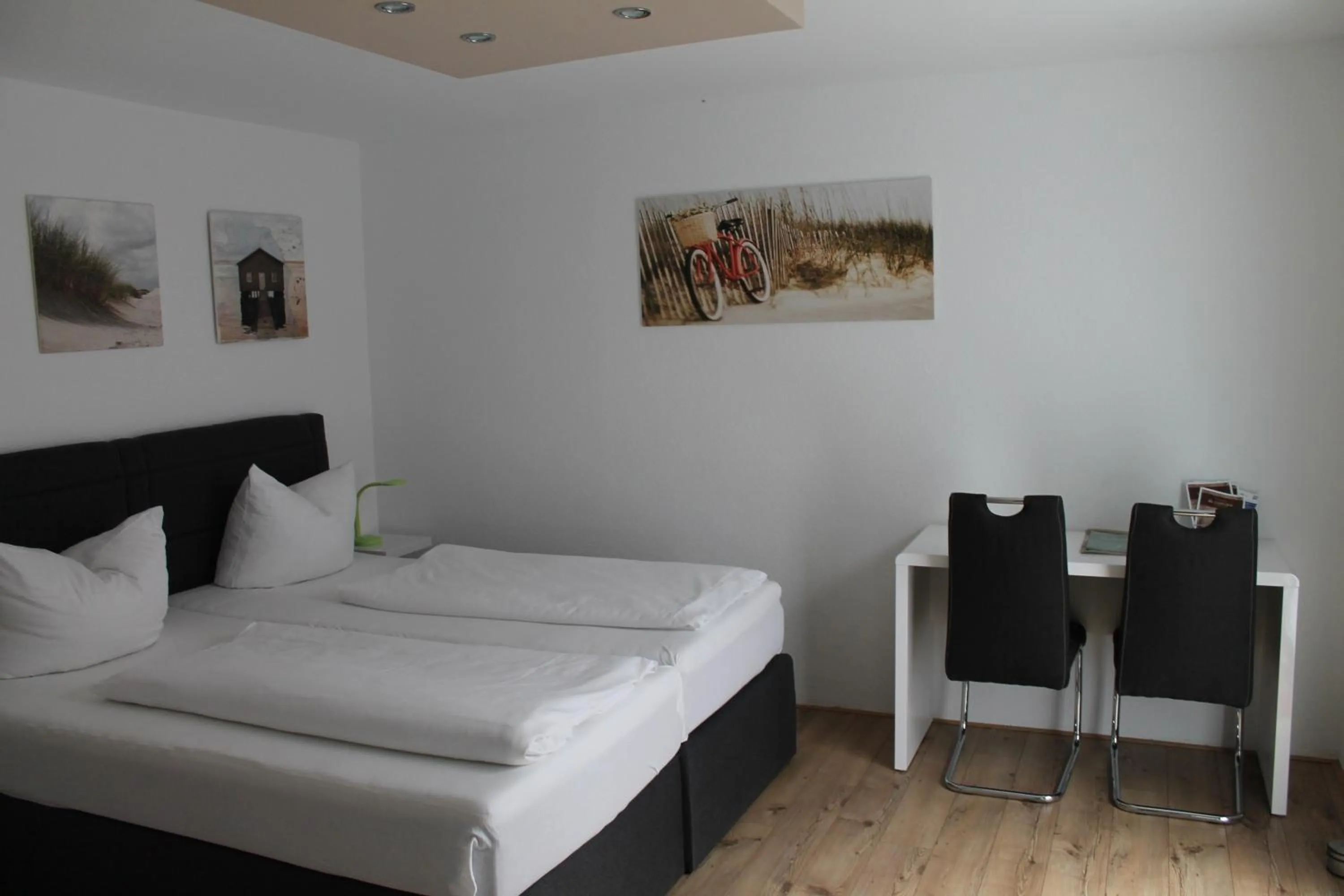 Bed in Hotel Rheinischer Hof