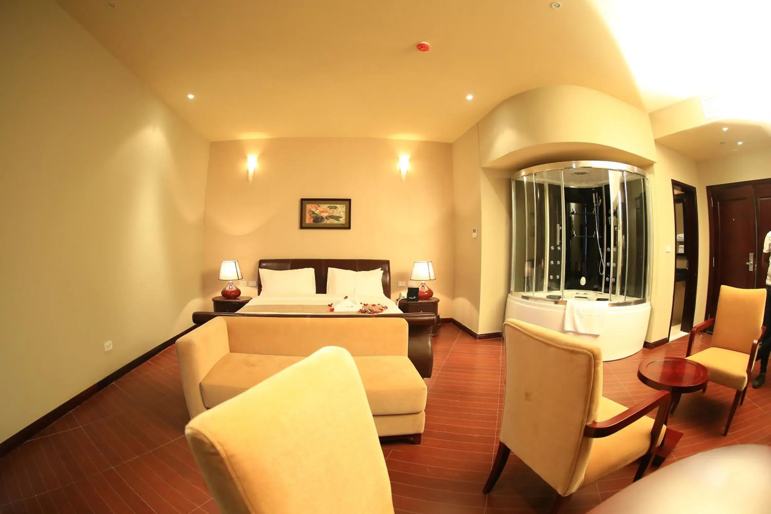 Living room, Bed in Magnolia Hotel & Conference Center Living room, Bed in Magnolia Hotel & Conference Center