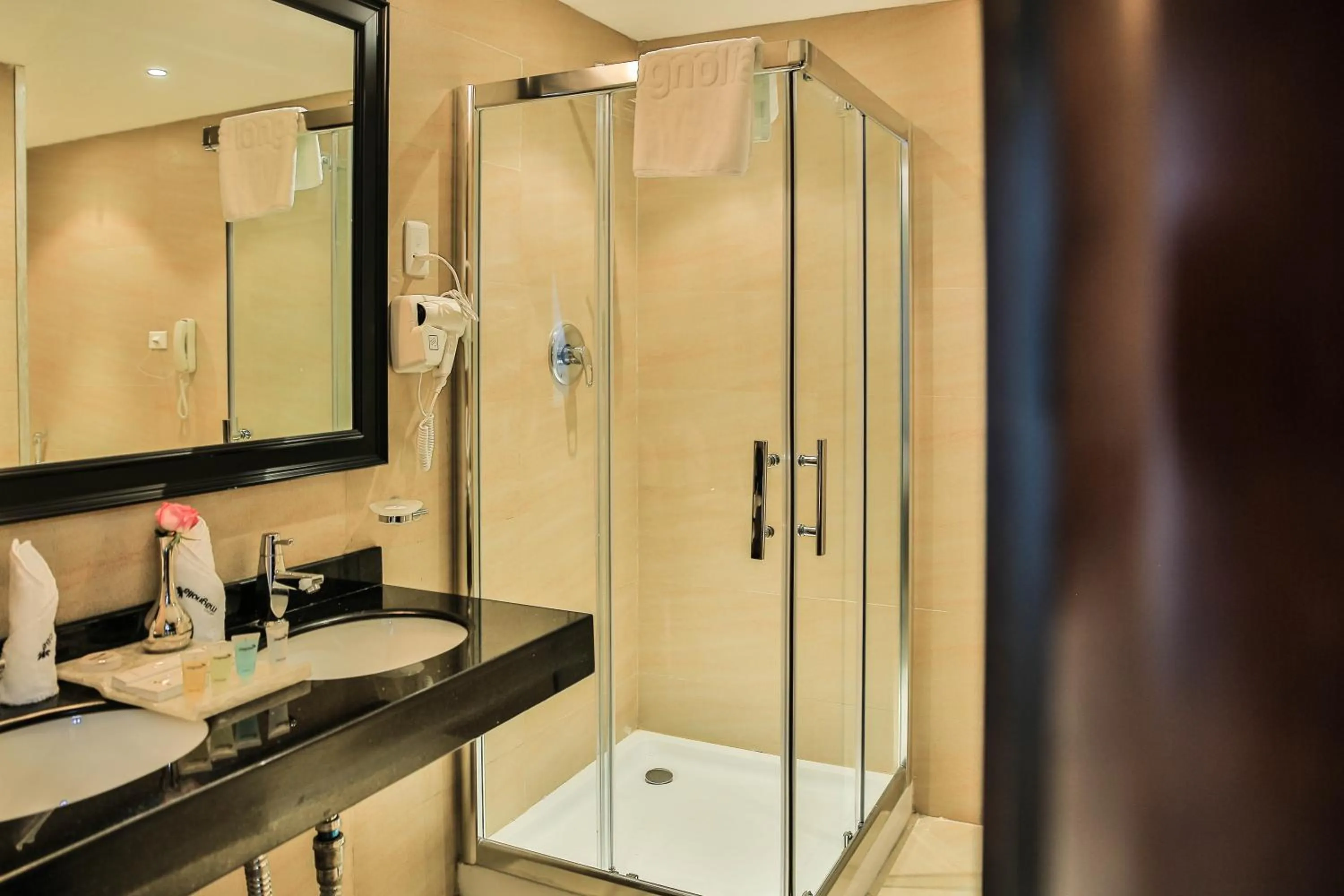 Bathroom in Magnolia Hotel & Conference Center