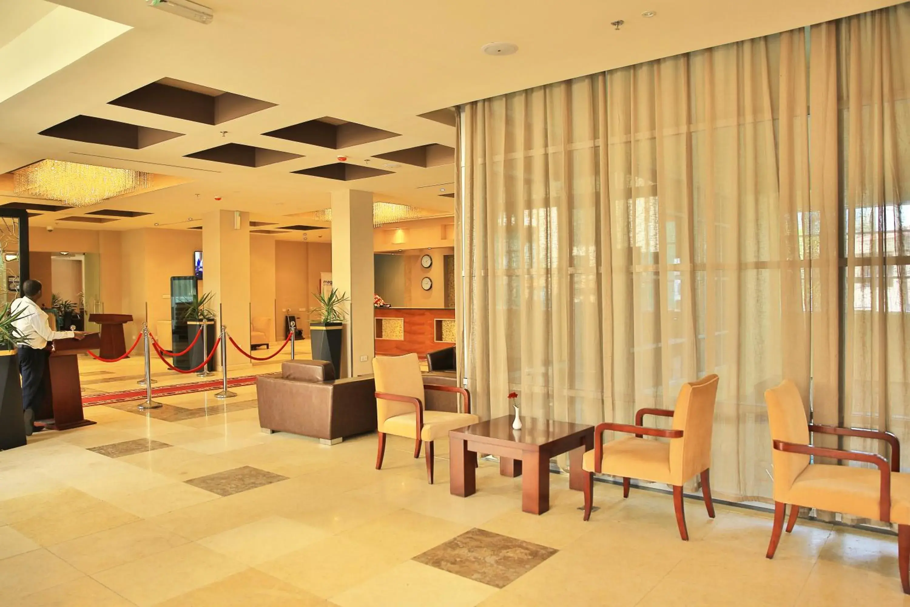 Lobby or reception in Magnolia Hotel & Conference Center Lobby or reception in Magnolia Hotel & Conference Center