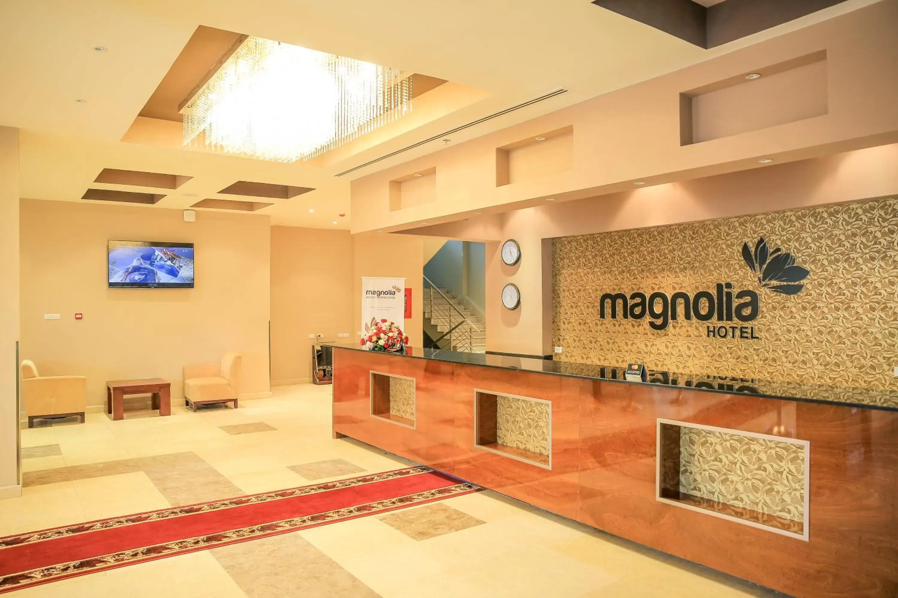 Lobby or reception in Magnolia Hotel & Conference Center Lobby or reception in Magnolia Hotel & Conference Center