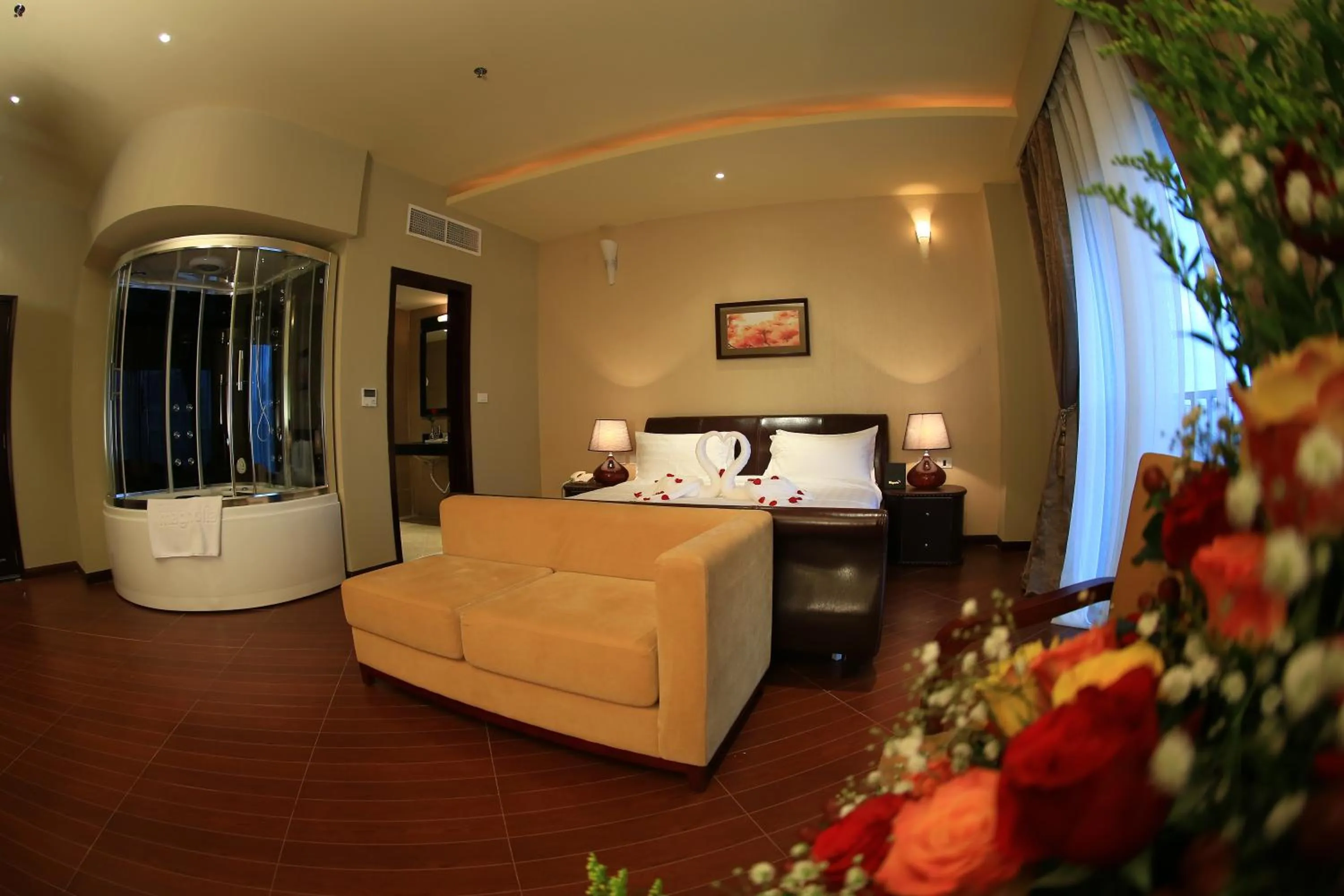 Photo of the whole room, Bed in Magnolia Hotel & Conference Center