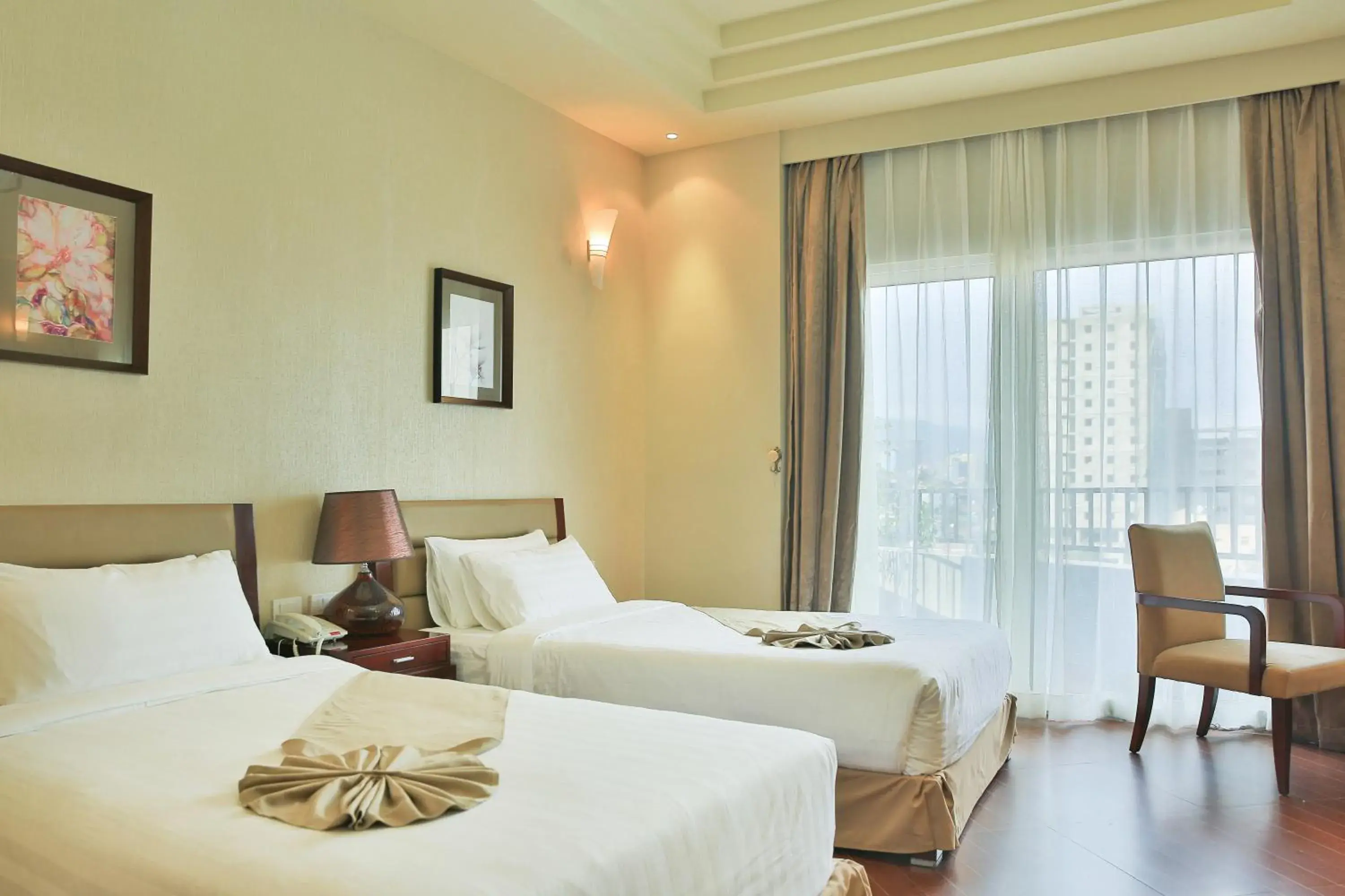 Bed in Magnolia Hotel & Conference Center Bed in Magnolia Hotel & Conference Center