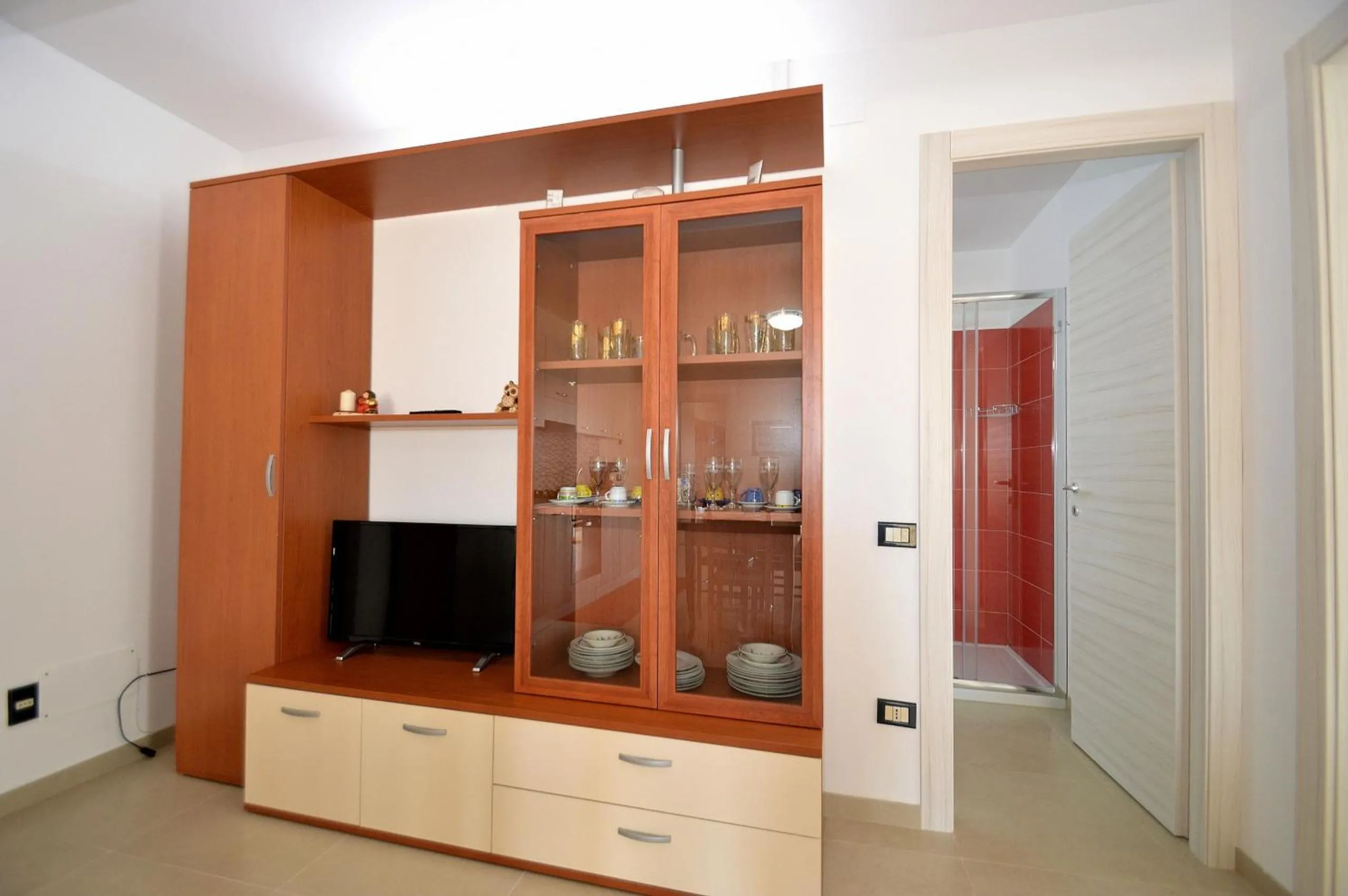 Communal lounge/ TV room in Villa Bianca e Villa Arancio