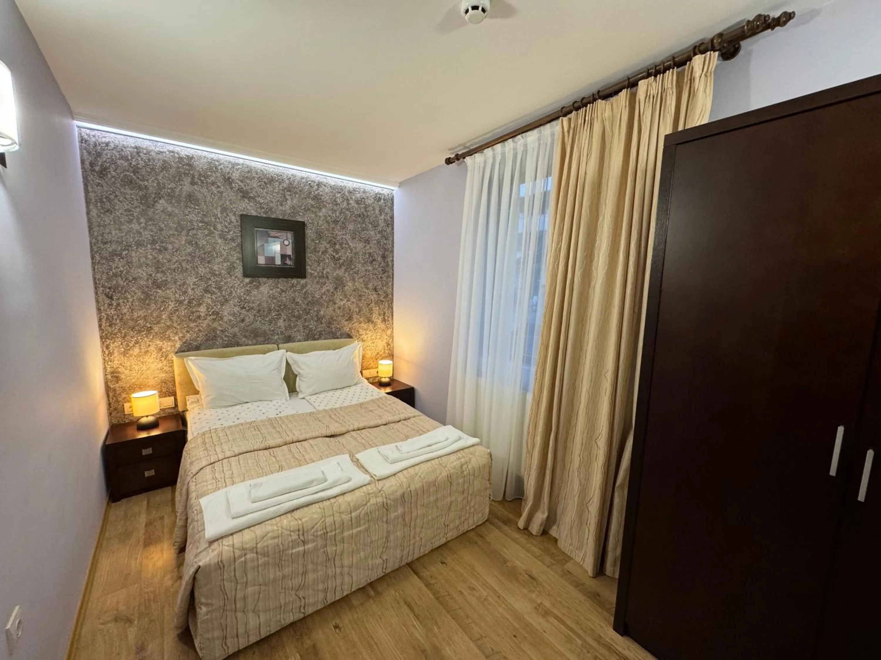 Bed in Family Hotel Eterno